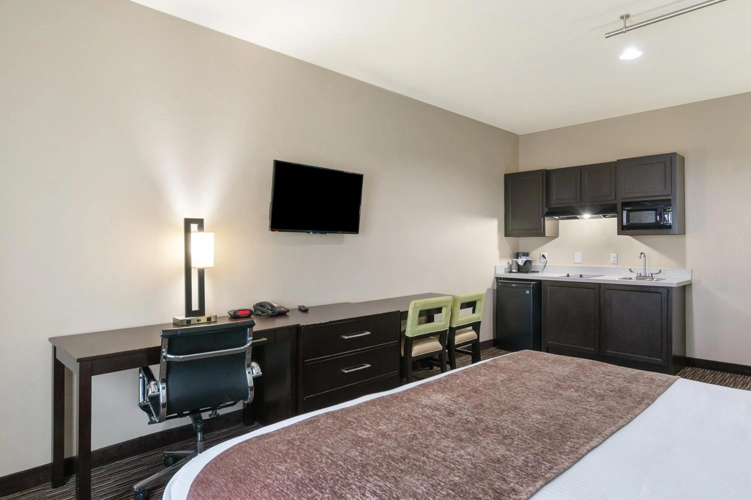 Kitchen or kitchenette, Bed in Residency Suites