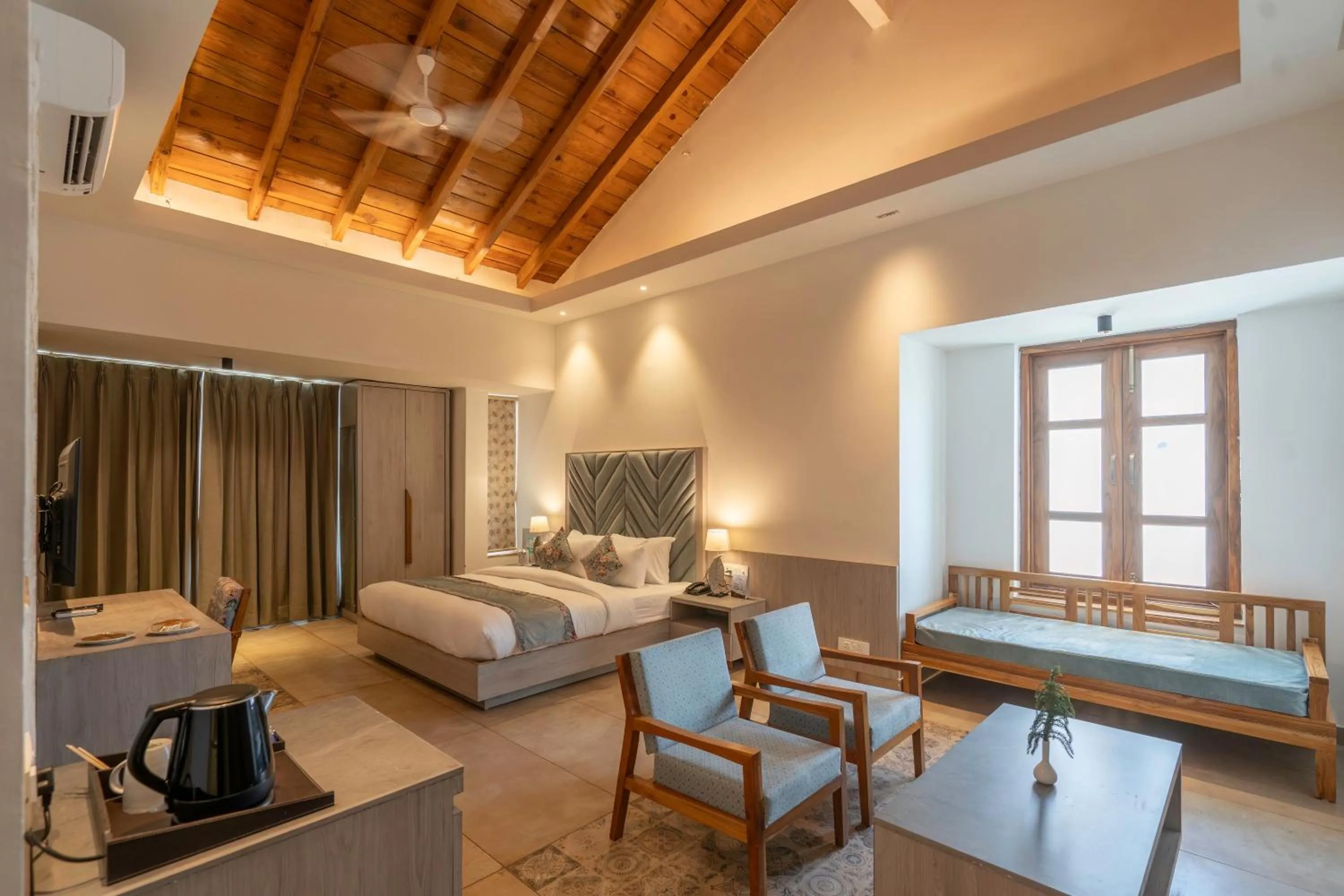 Bed in Evara Spa & Resort