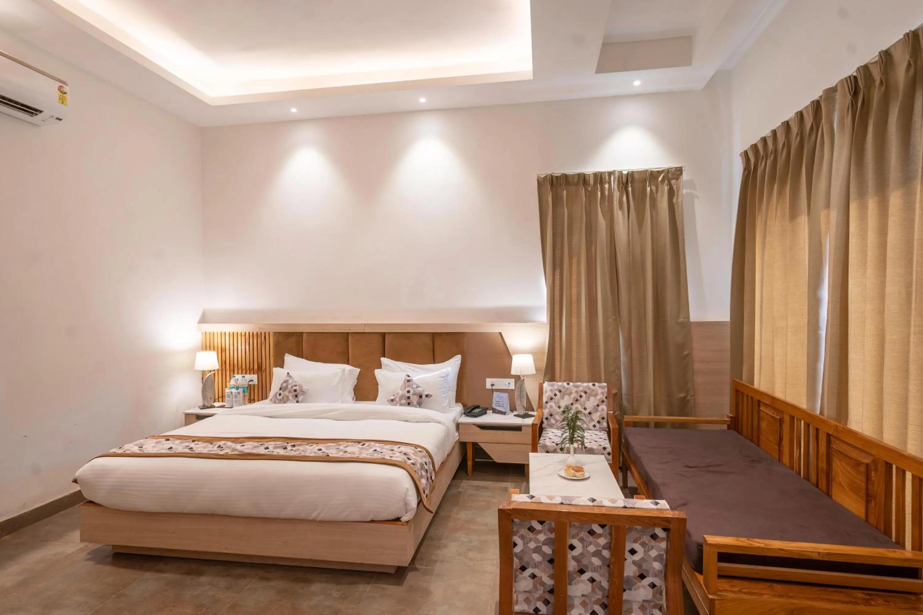 Bed in Evara Spa & Resort