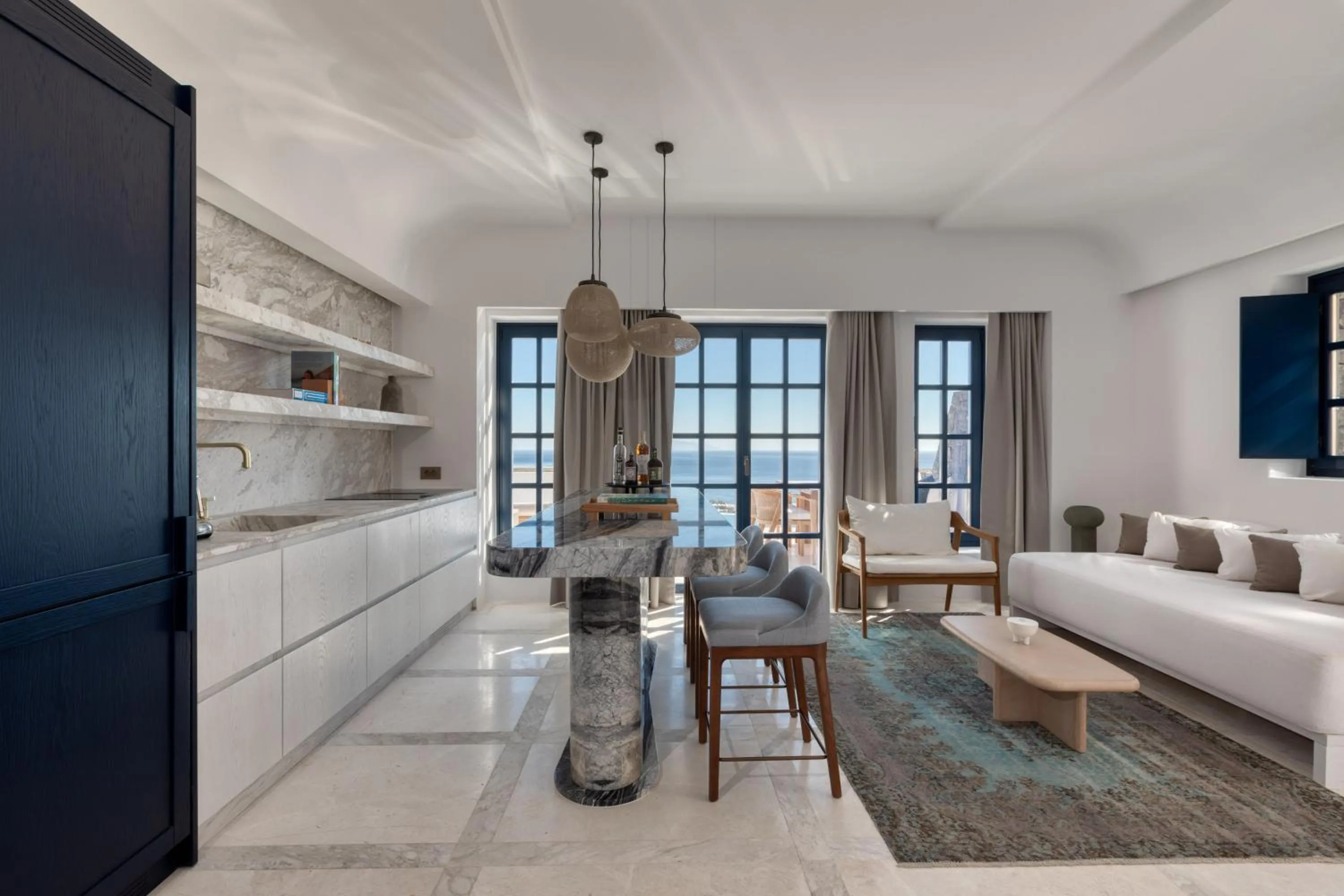 Living room, Bed in Sandblu Santorini, LXR Hotels & Resorts