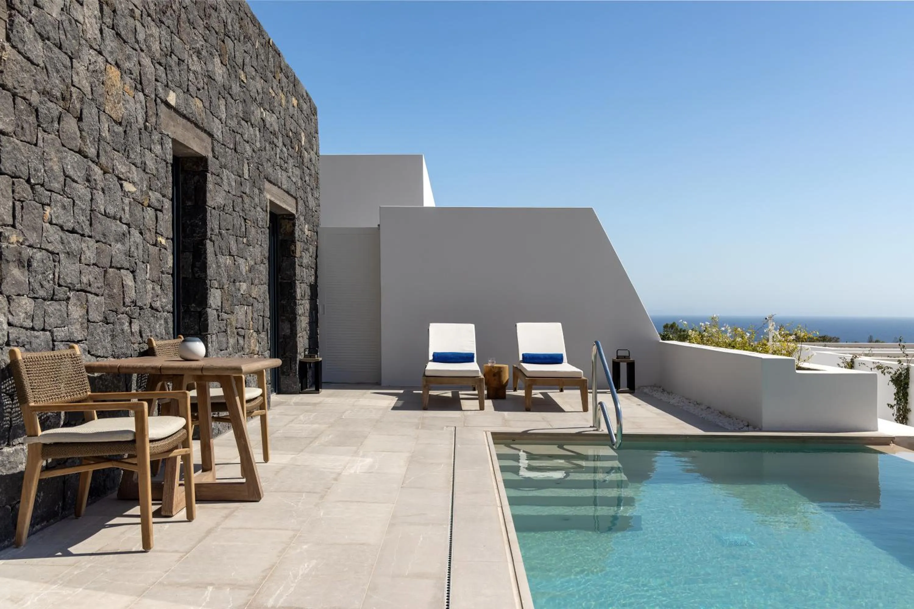 Swimming pool in Sandblu Santorini, LXR Hotels & Resorts
