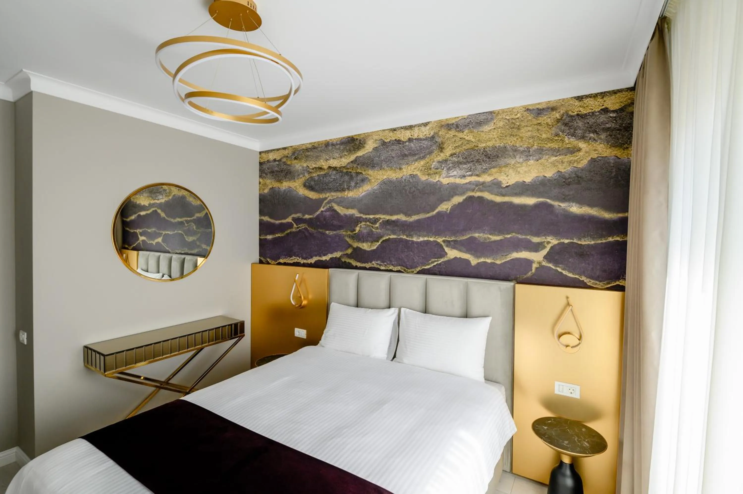 Bed in Elitte Inn & Suites