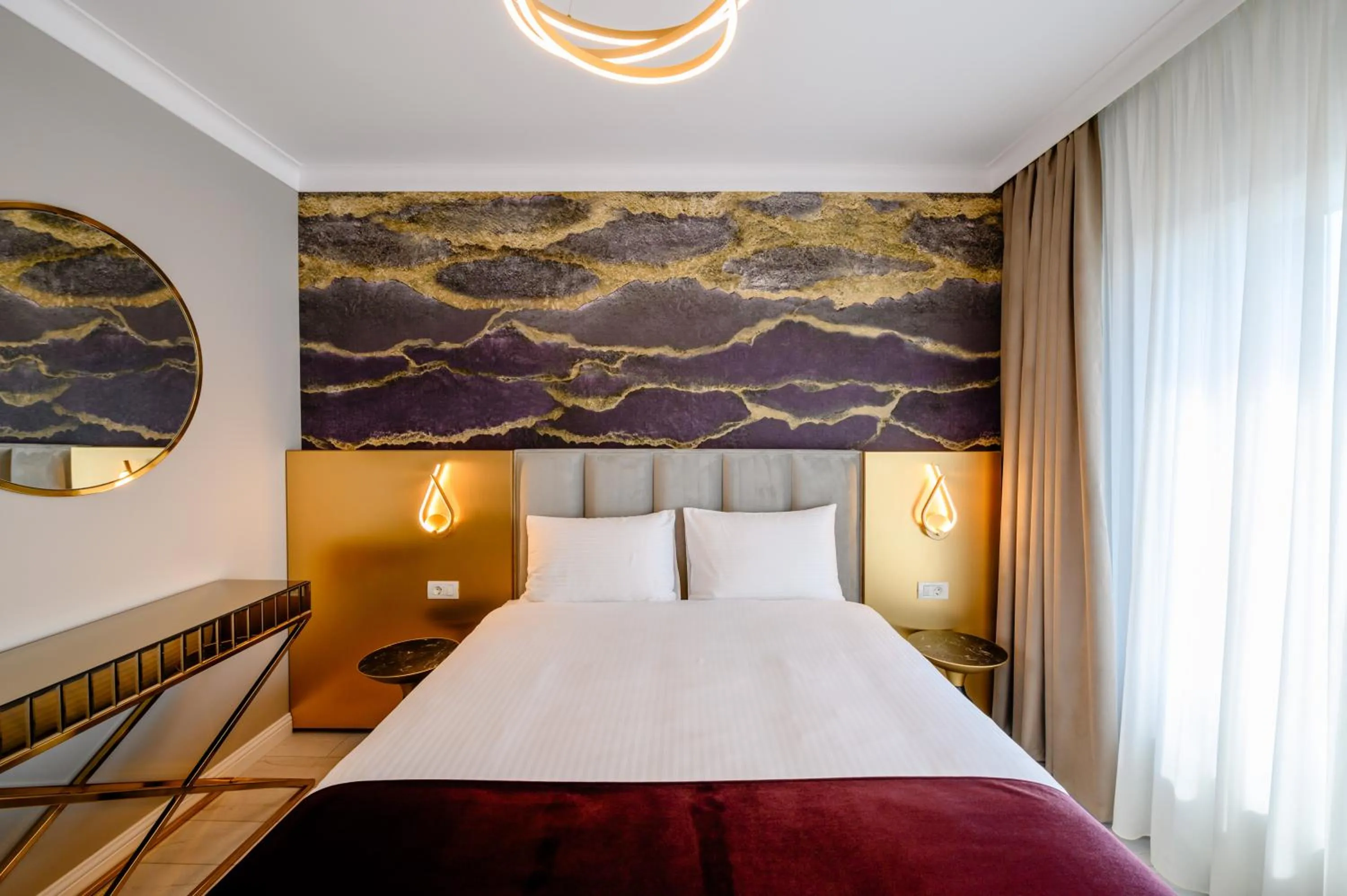 Bed in Elitte Inn & Suites