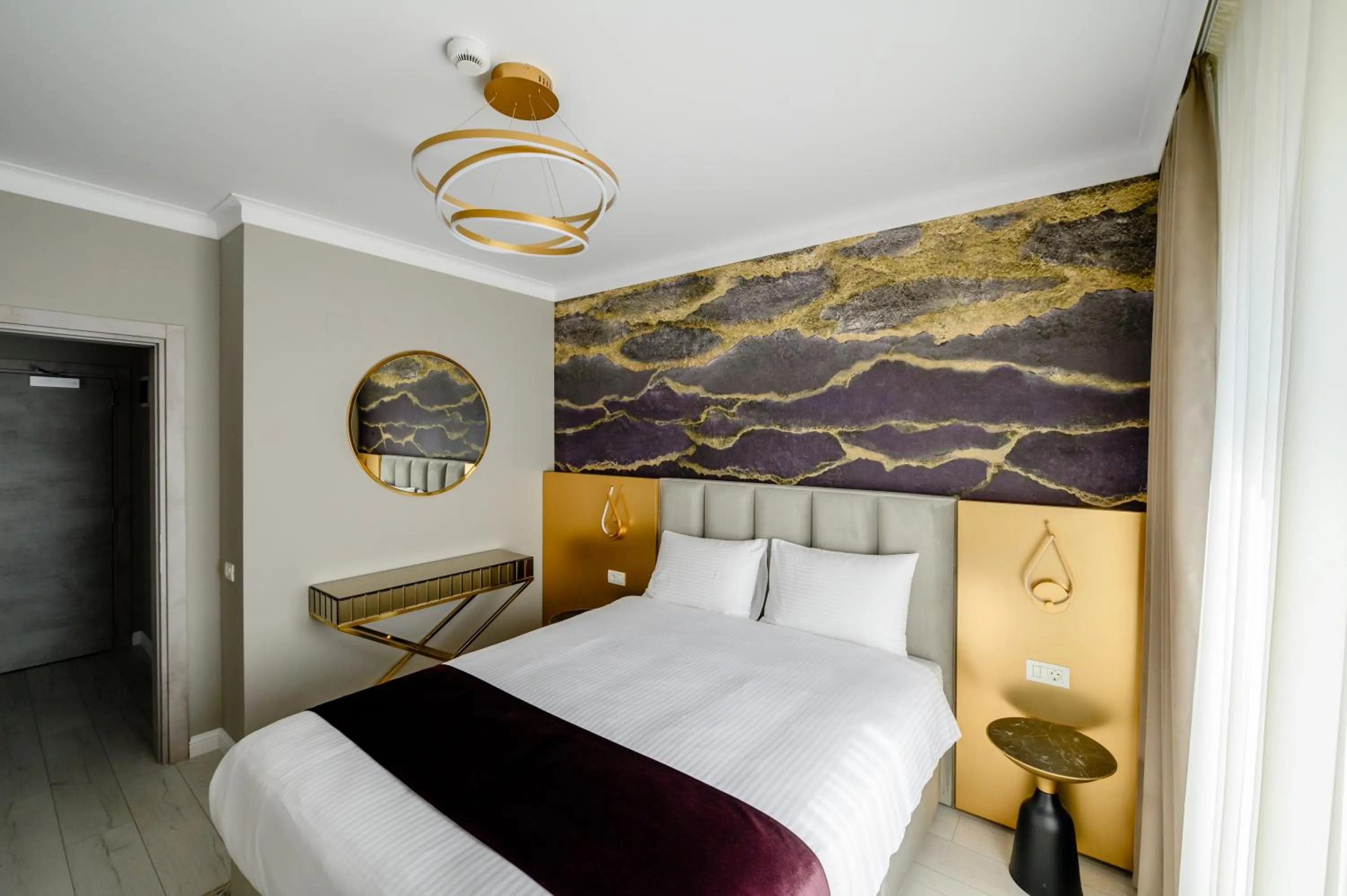 Bed in Elitte Inn & Suites