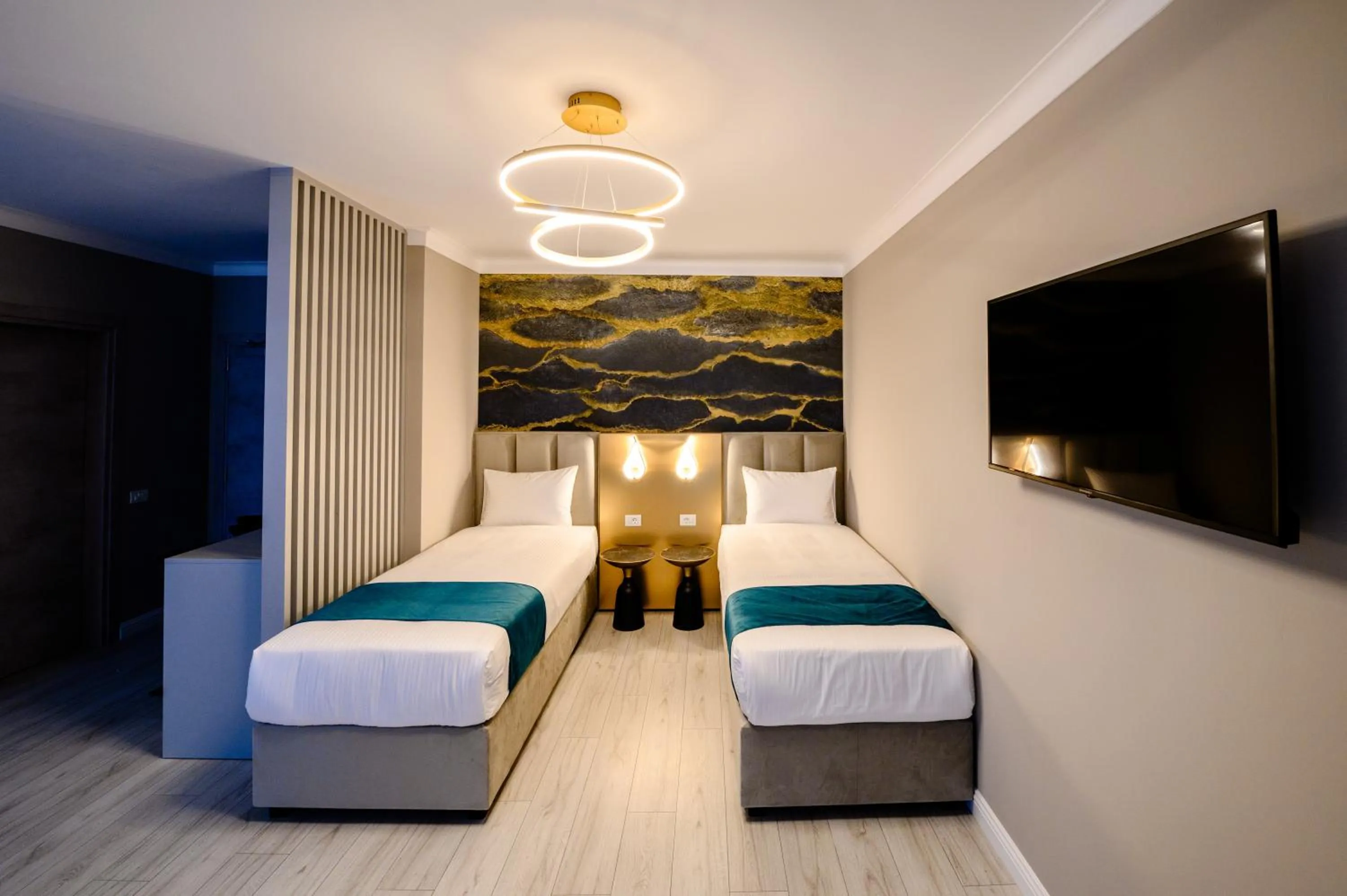 Bed in Elitte Inn & Suites