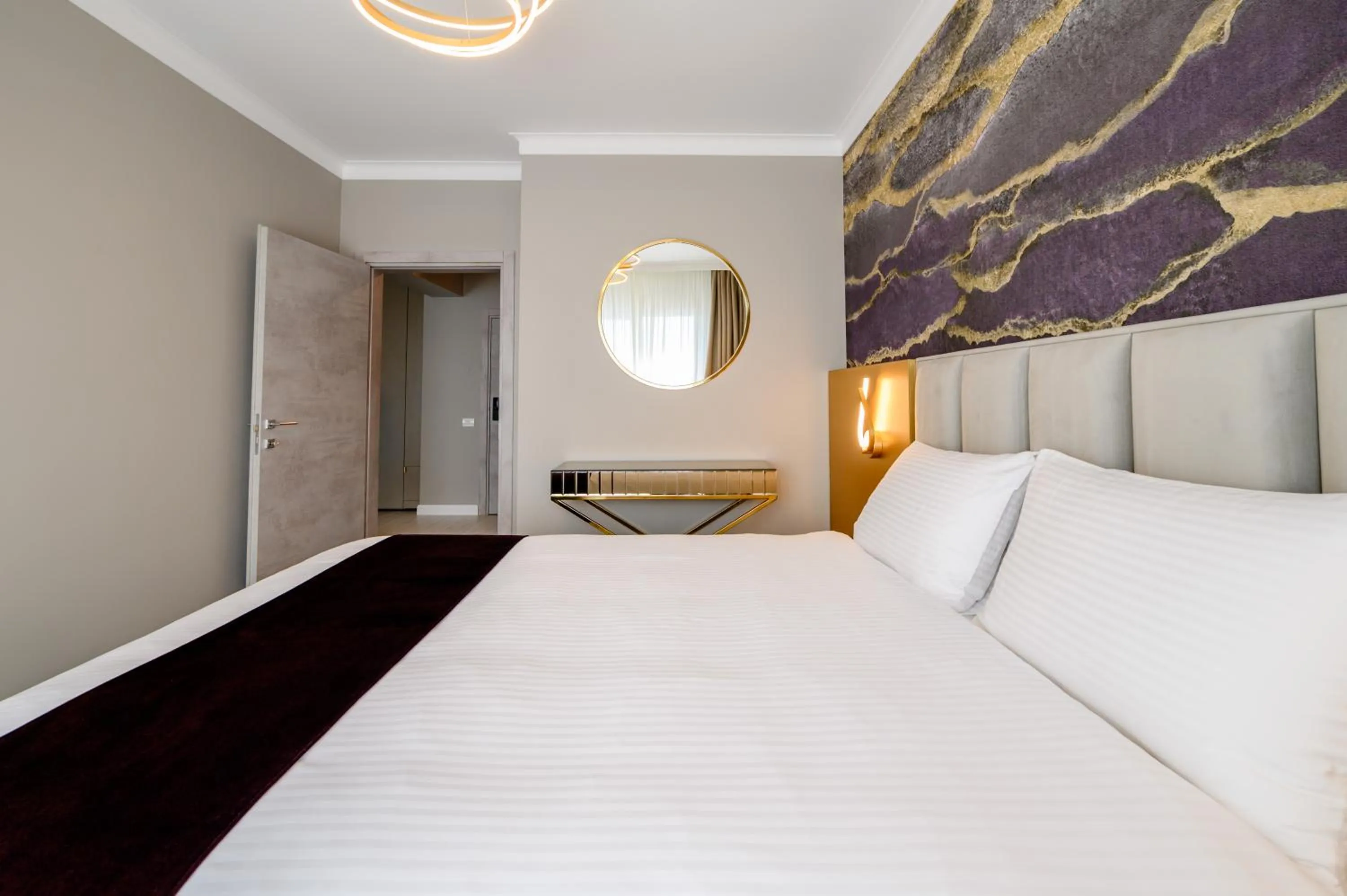 Bed in Elitte Inn & Suites