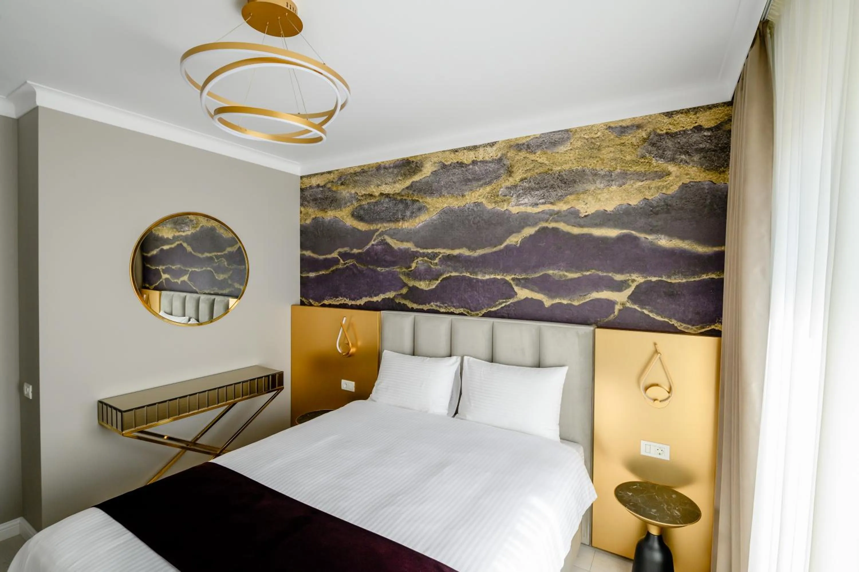 Bed in Elitte Inn & Suites