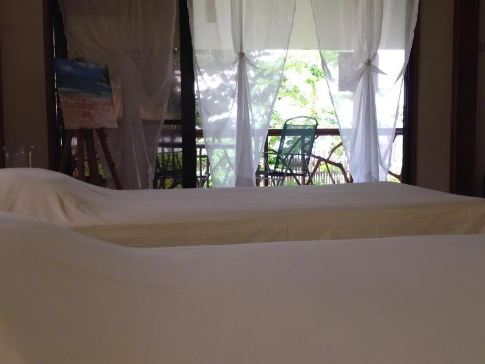Bed in Liwayway sa Bohol Pamilacan Resort