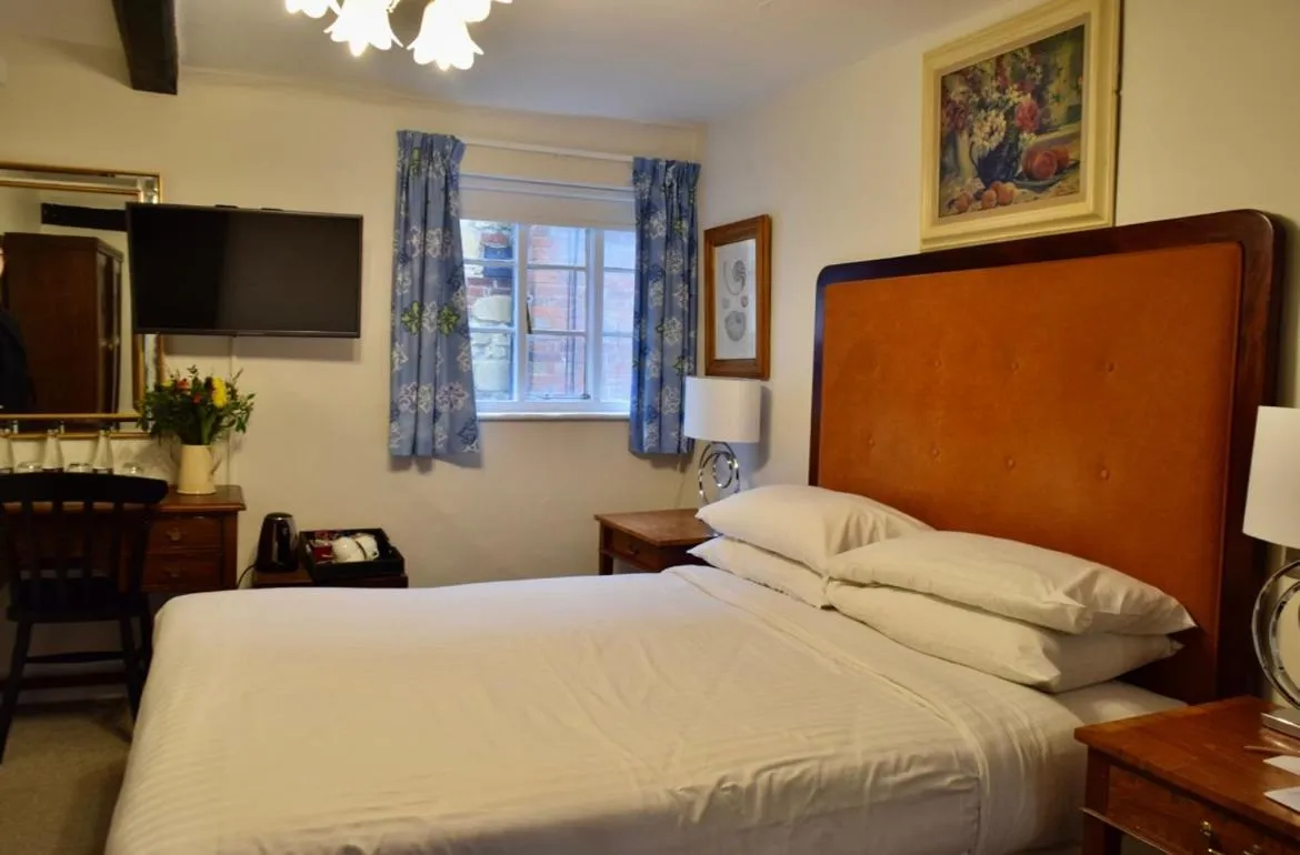 Bed in Noel Arms - "A Bespoke Hotel"