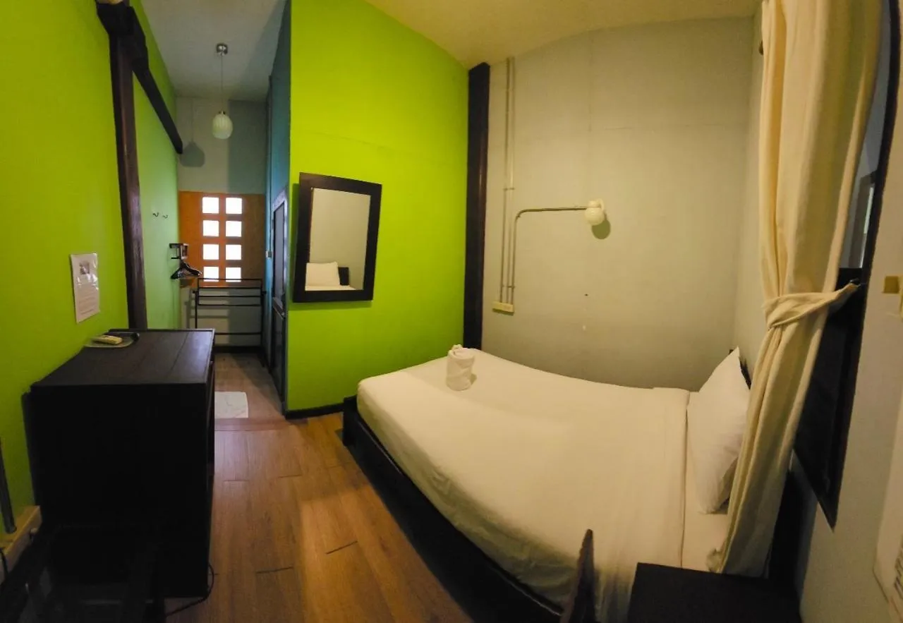 Bed in Mi Casa Thaphae Chiang Mai