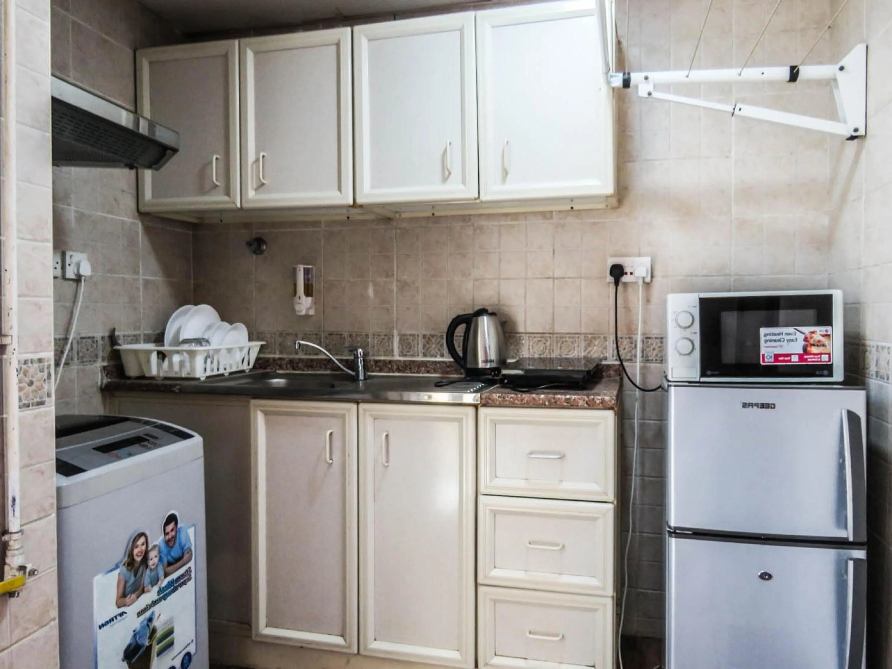 Kitchen or kitchenette in Al Ferdous Hotel Apartment