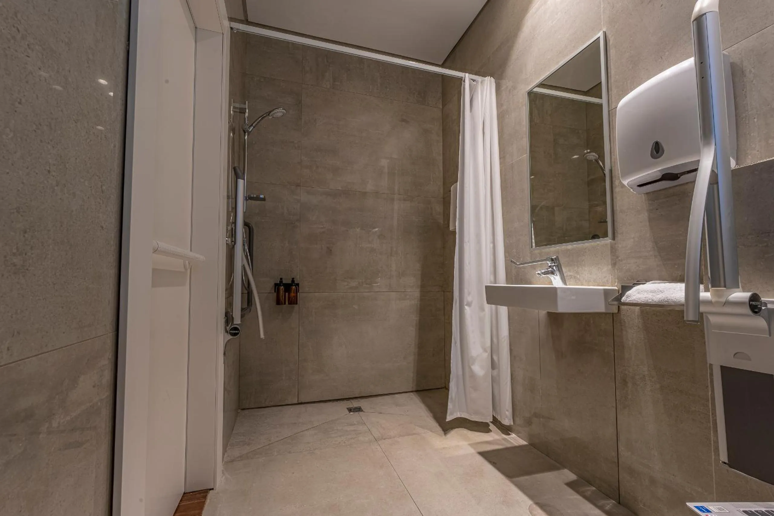 Shower in Hematian Hotel by Effy