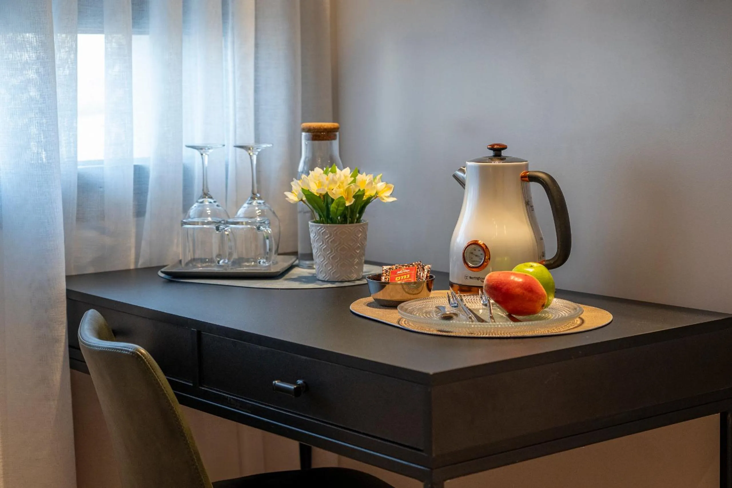 Coffee/tea facilities in Hematian Hotel by Effy