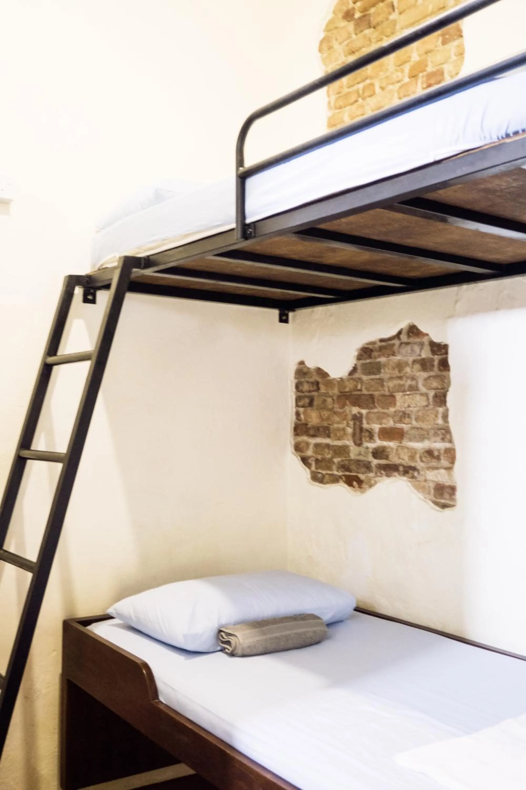 Bed in Sojourn Beds & Cafe