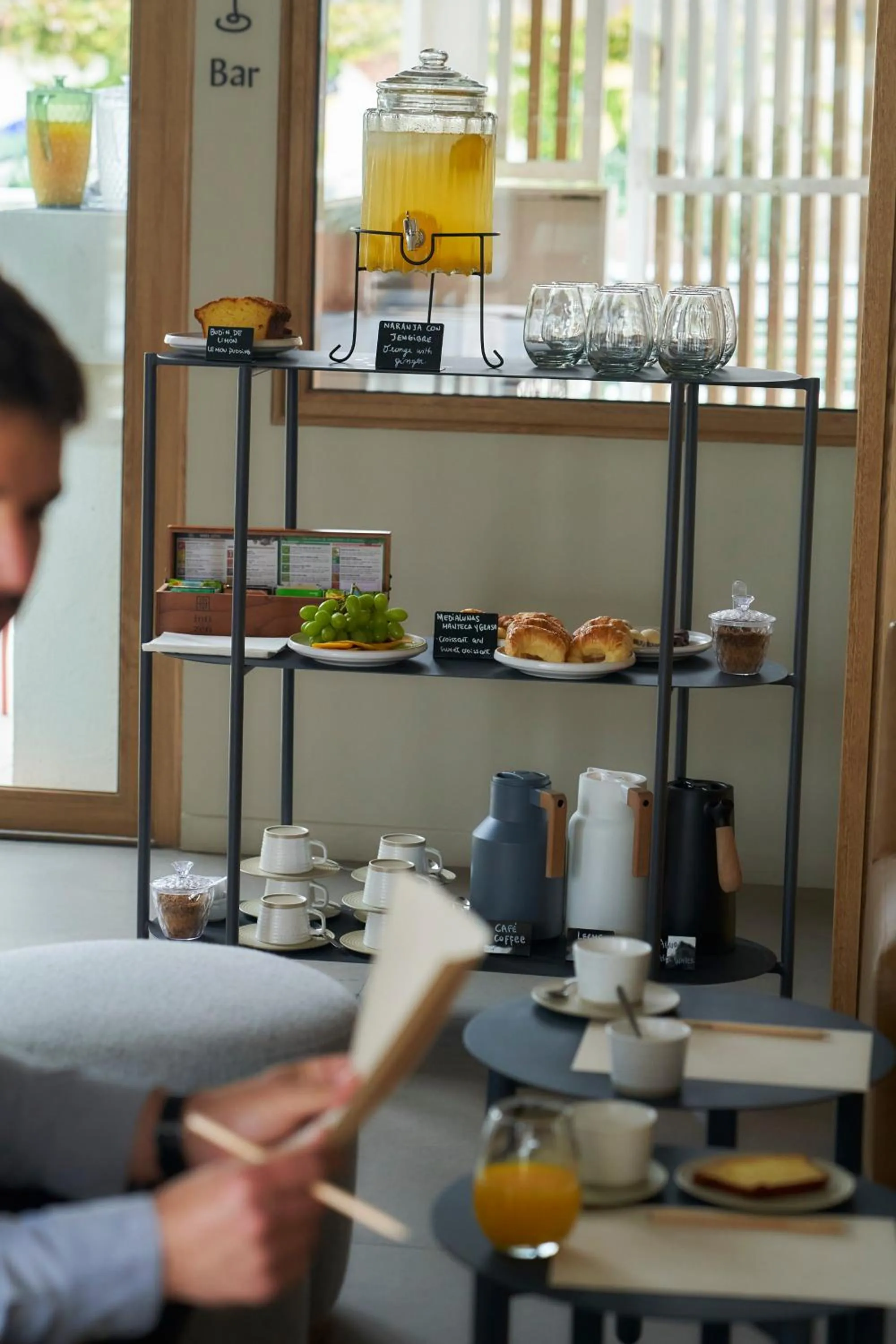 Communal lounge/ TV room in Bromelia Hotel Boutique