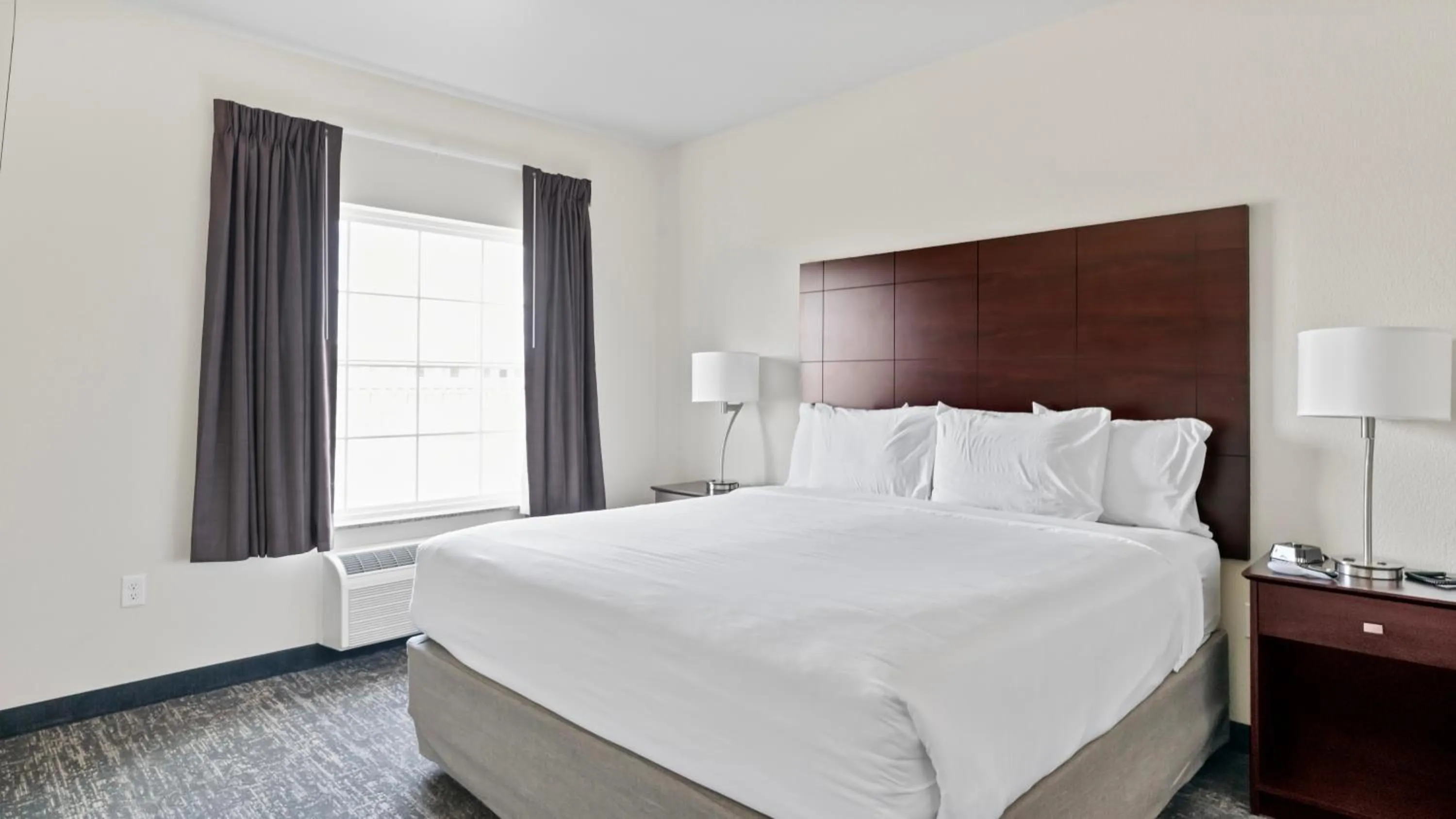 Bed in Cobblestone Inn & Suites - Julesburg