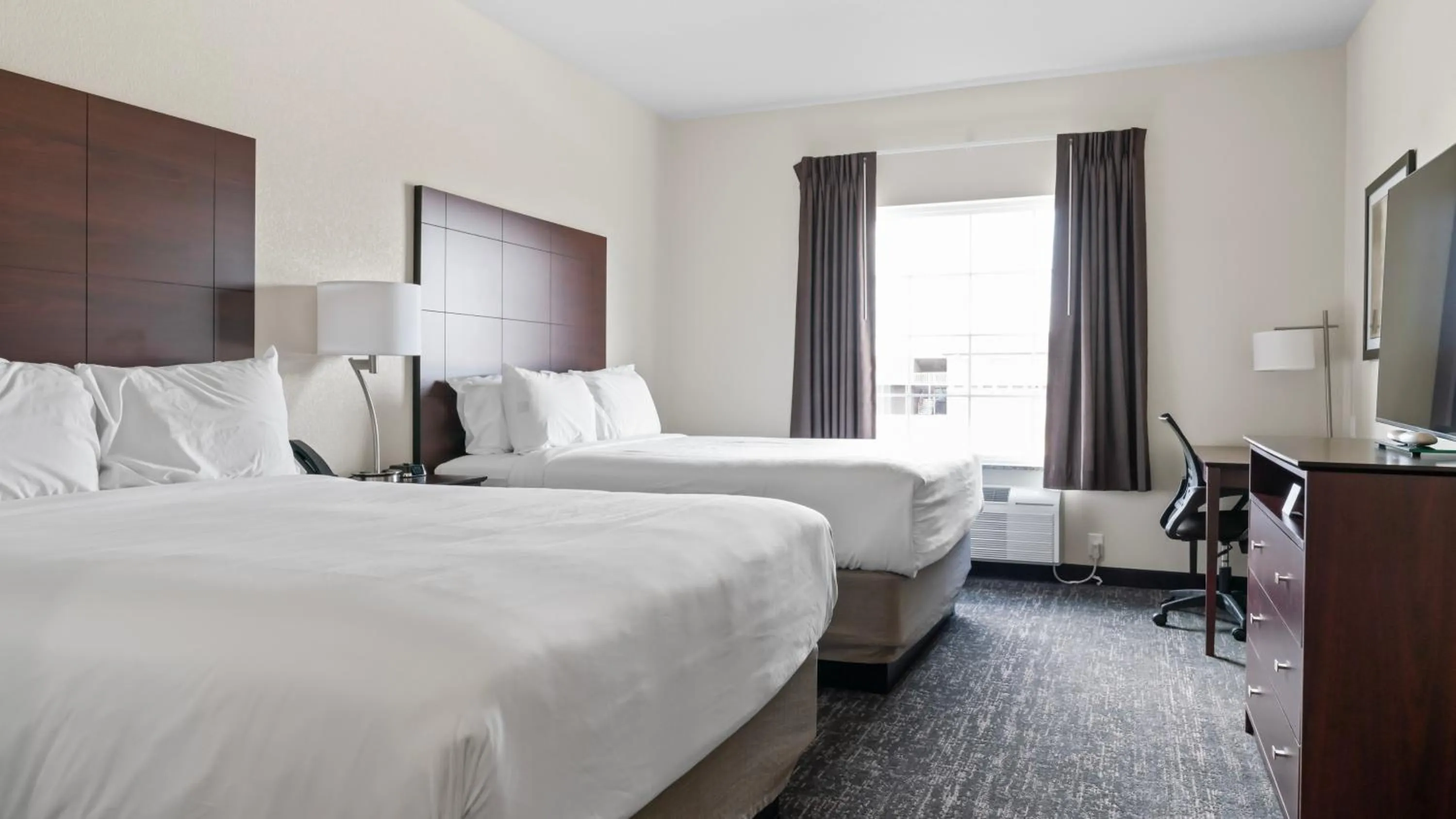 Bedroom, Bed in Cobblestone Inn & Suites - Julesburg