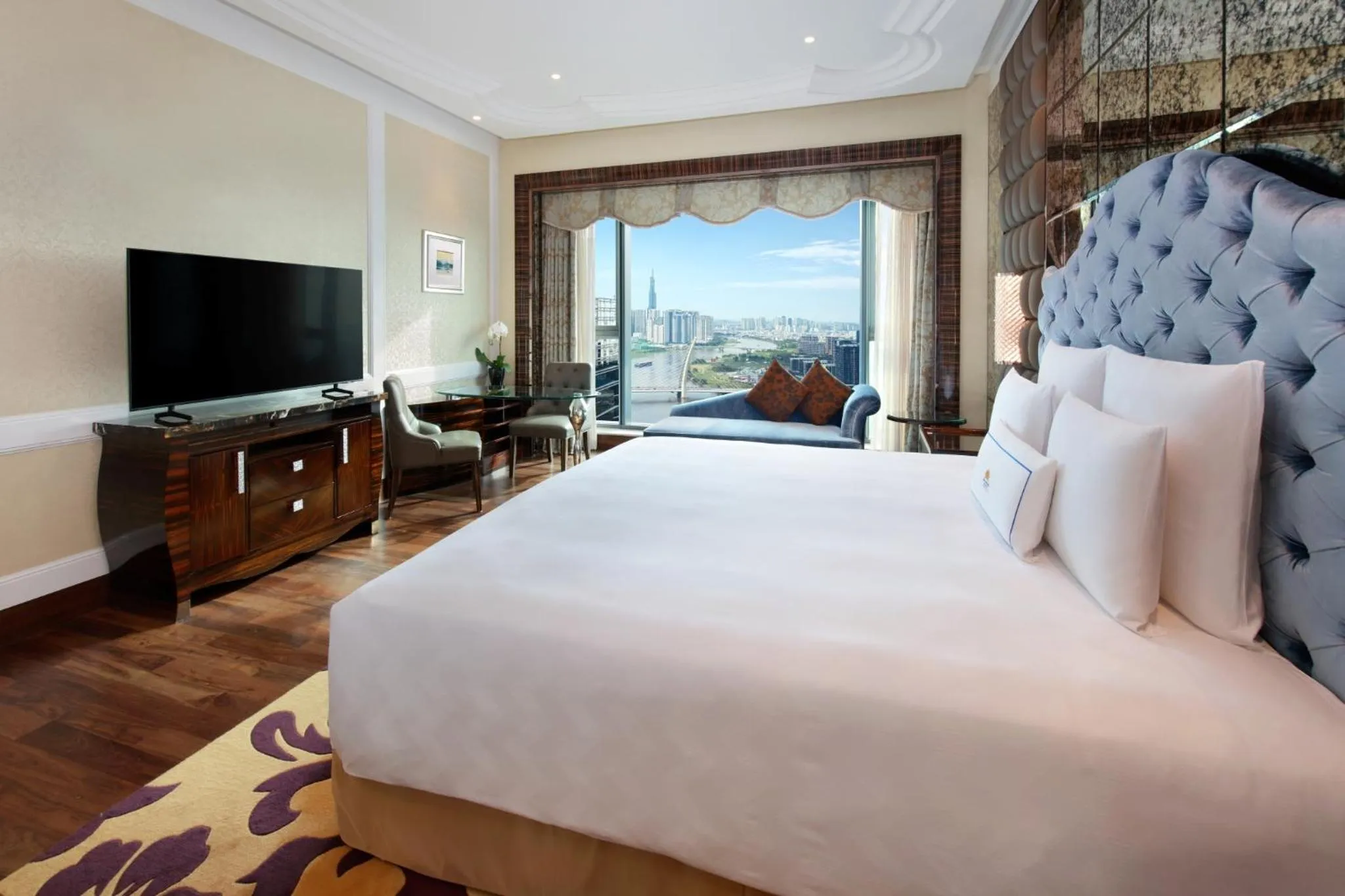 Bed in The Reverie Saigon