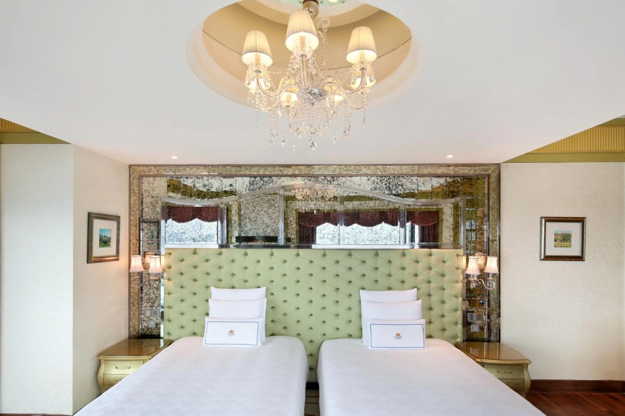 Bed in The Reverie Saigon