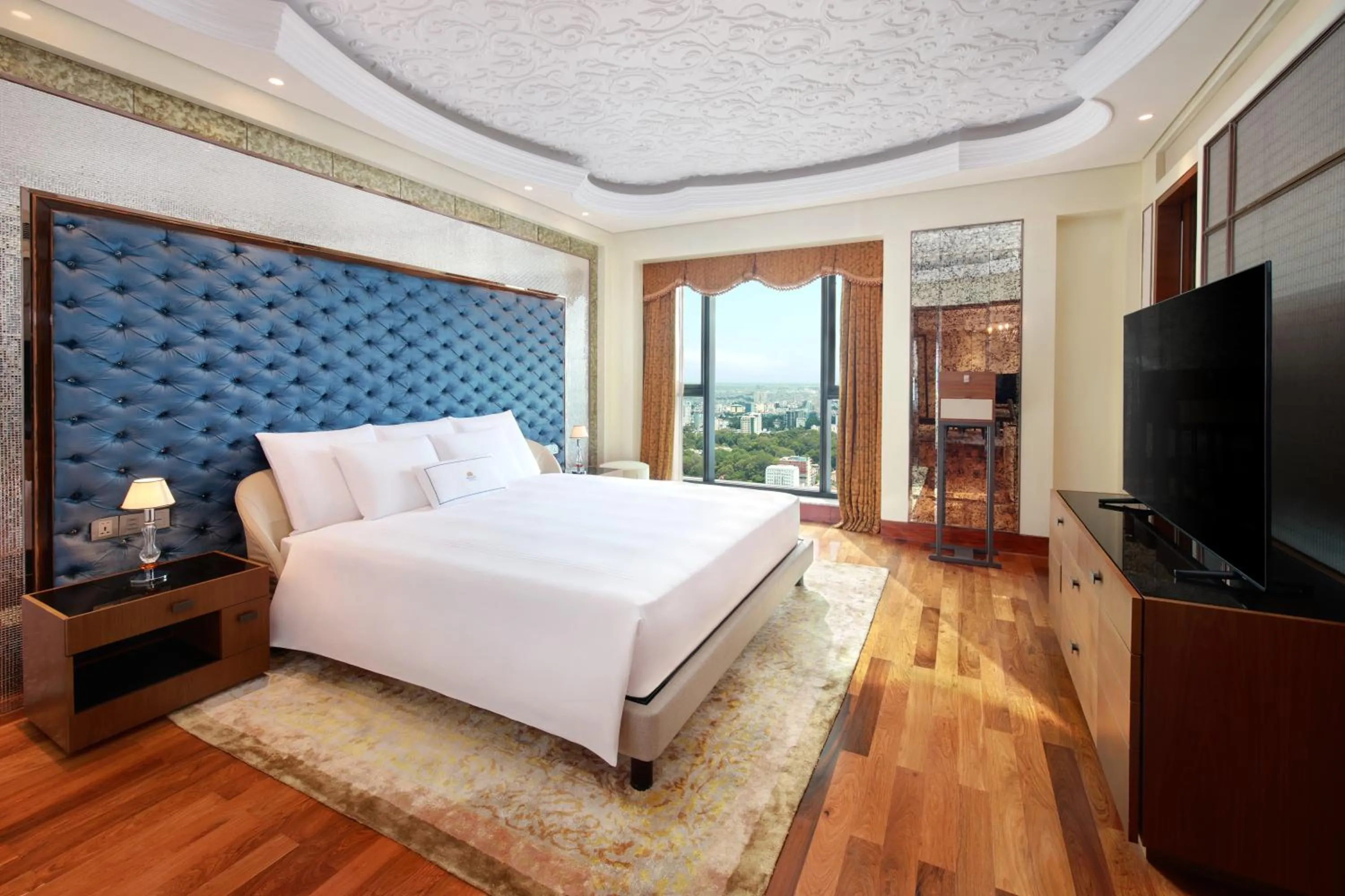 Bed in The Reverie Saigon