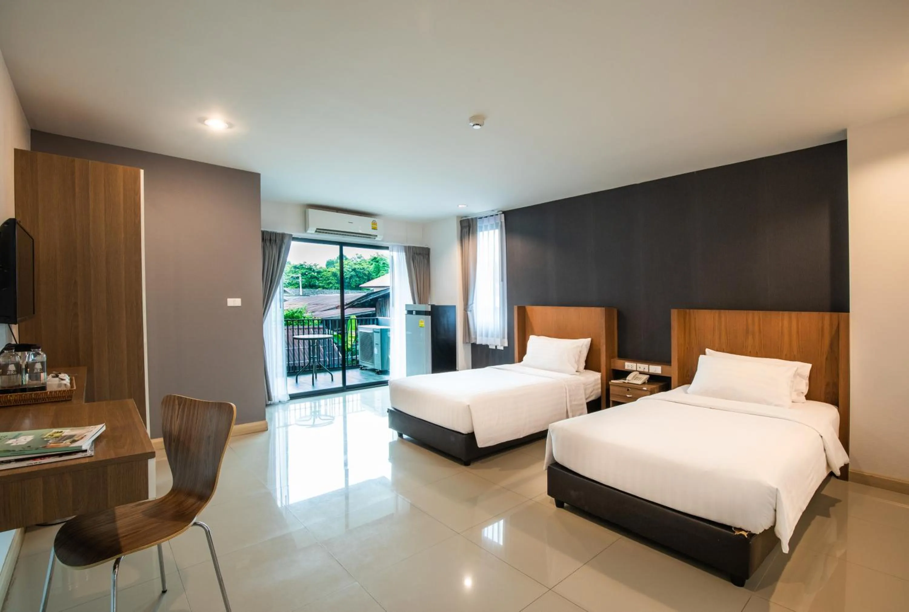Bed in Jira Boutique Residence