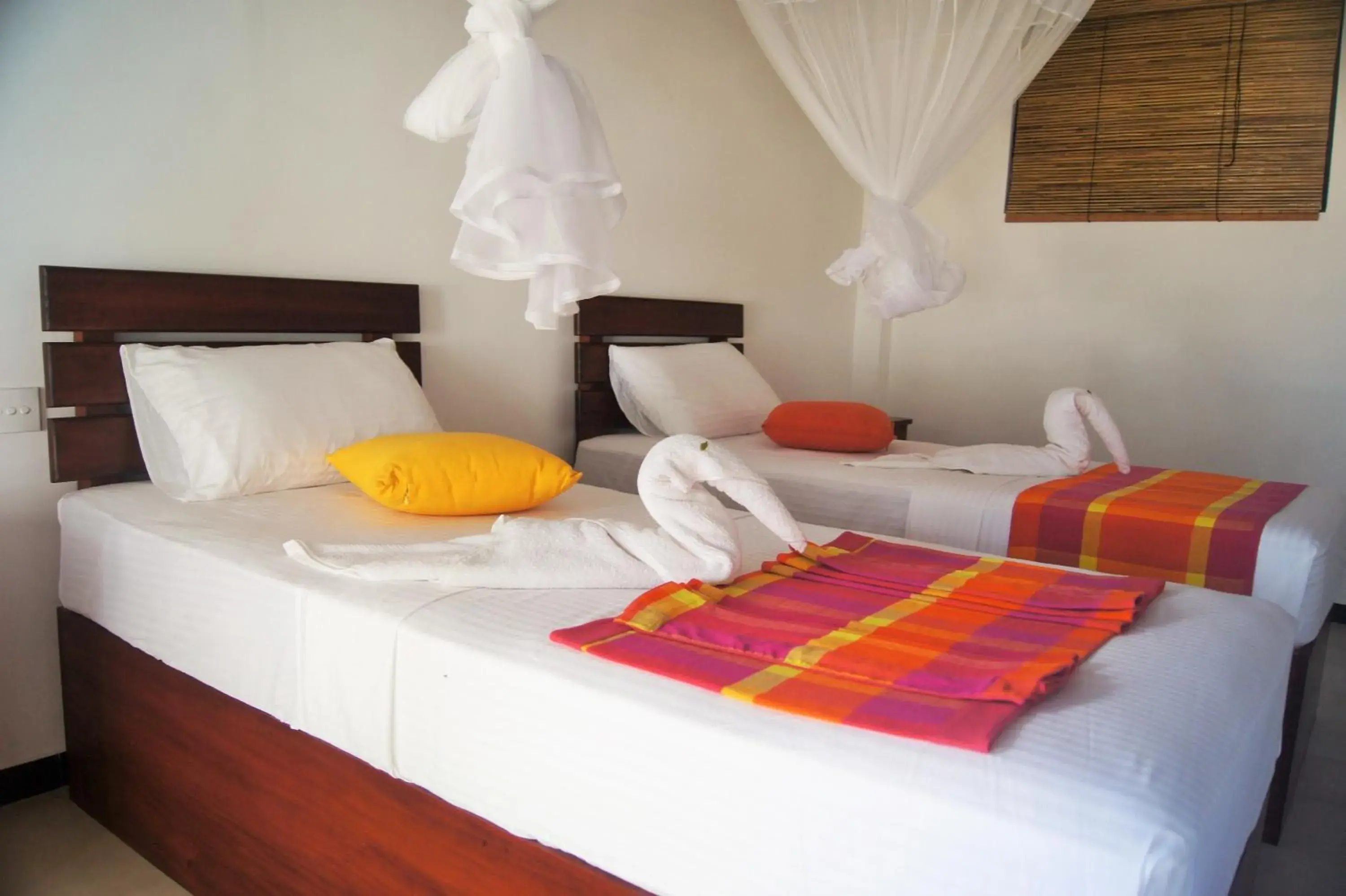 Deluxe Twin Room with Balcony and Sea View Air-con - single occupancy in Wellé Wadiya Beach Villa Deluxe Twin Room with Balcony and Sea View Air-con - single occupancy in Wellé Wadiya Beach Villa