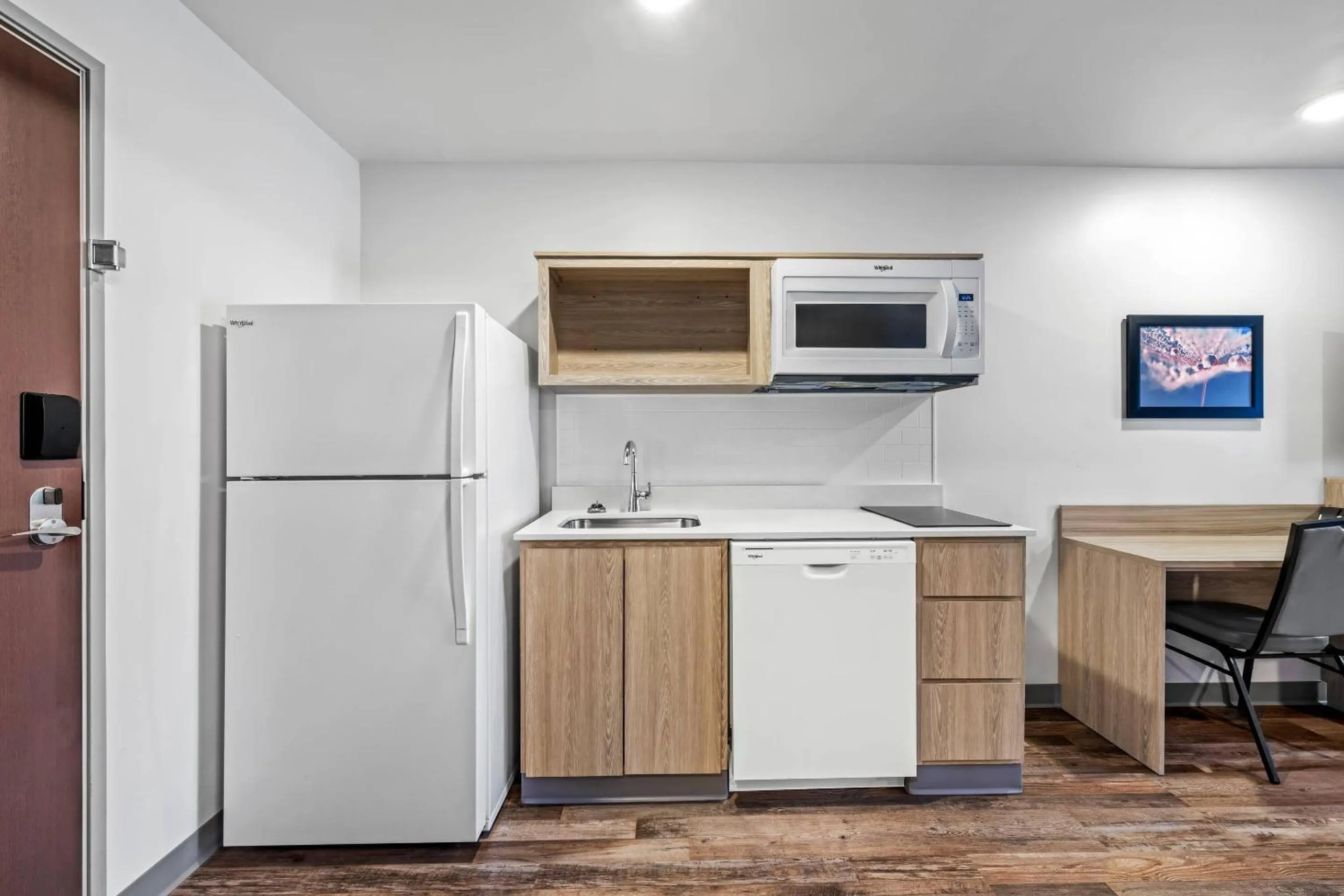 Bedroom in WoodSpring Suites Winston-Salem near Hanes Mall