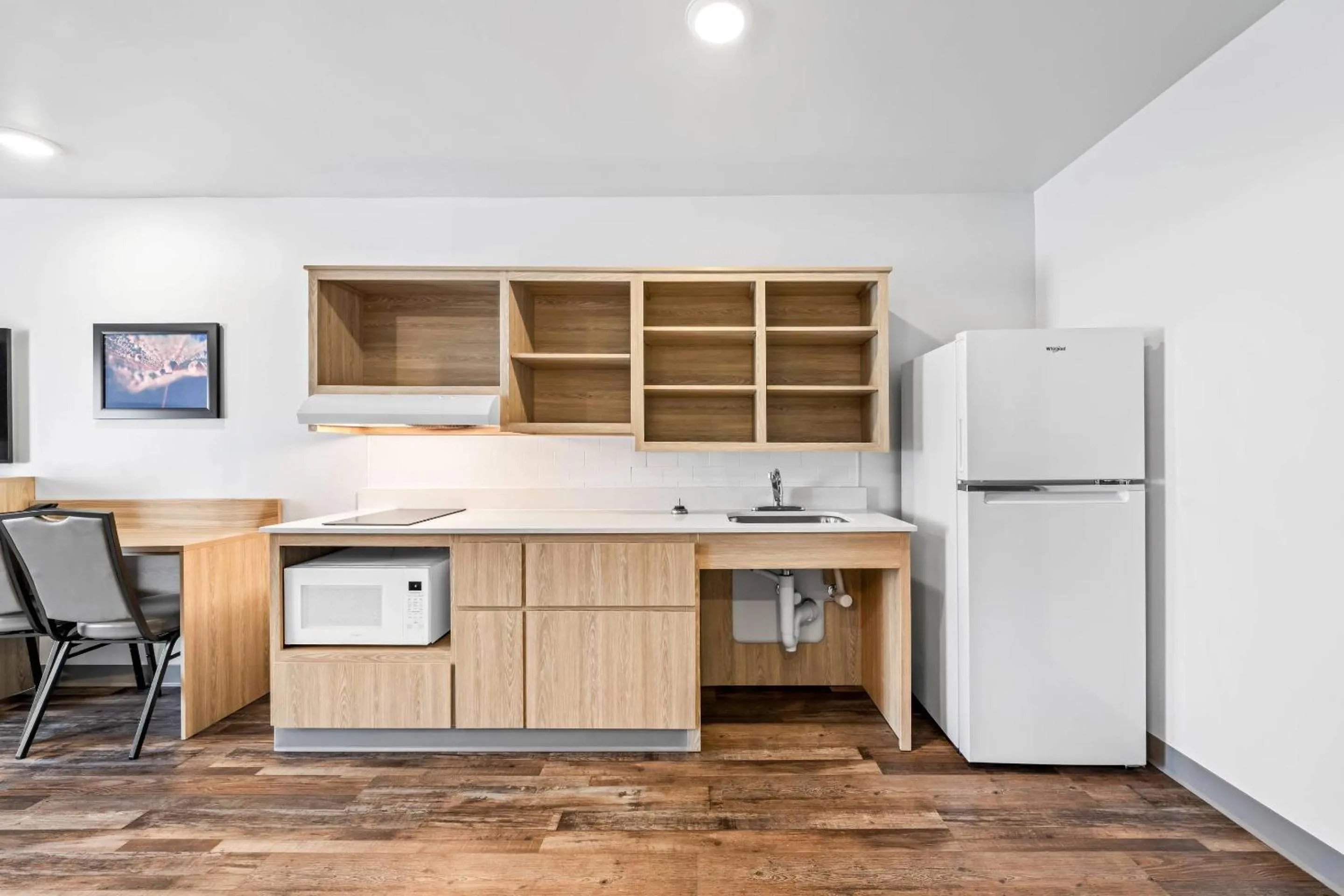 Bedroom in WoodSpring Suites Winston-Salem near Hanes Mall