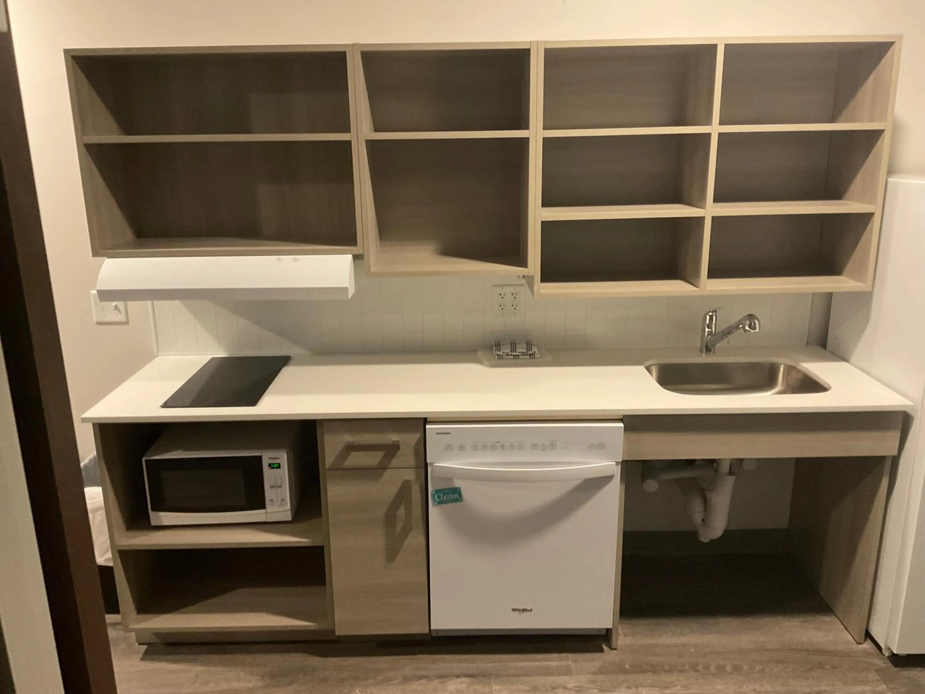 Kitchen or kitchenette in WoodSpring Suites Winston-Salem near Hanes Mall