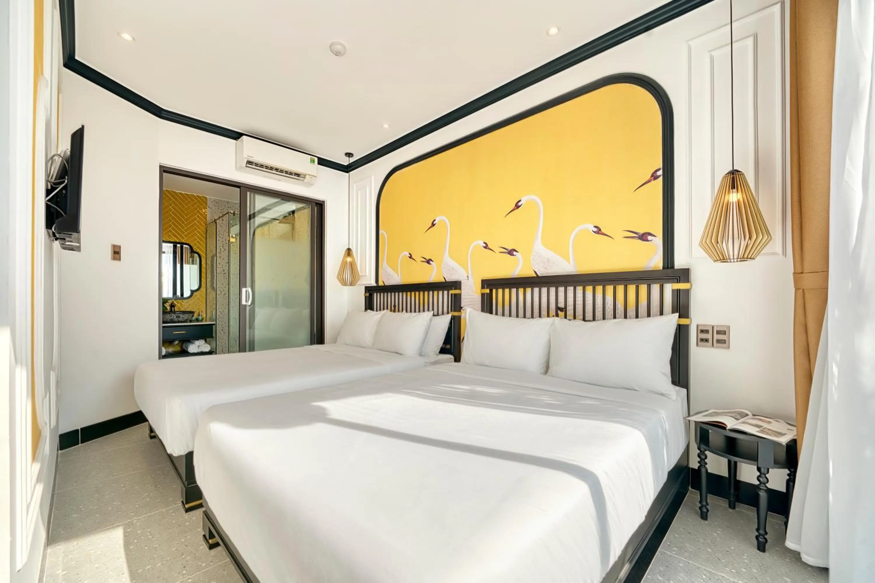 Bed in Rokas Hoi An Boutique Hotel