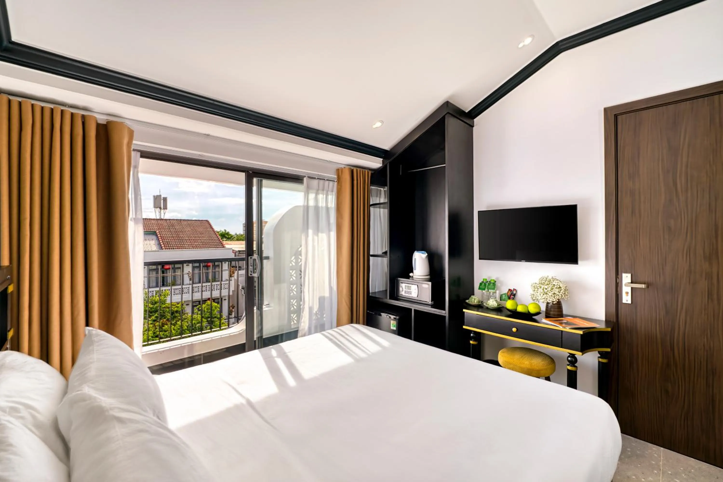 Bed in Rokas Hoi An Boutique Hotel