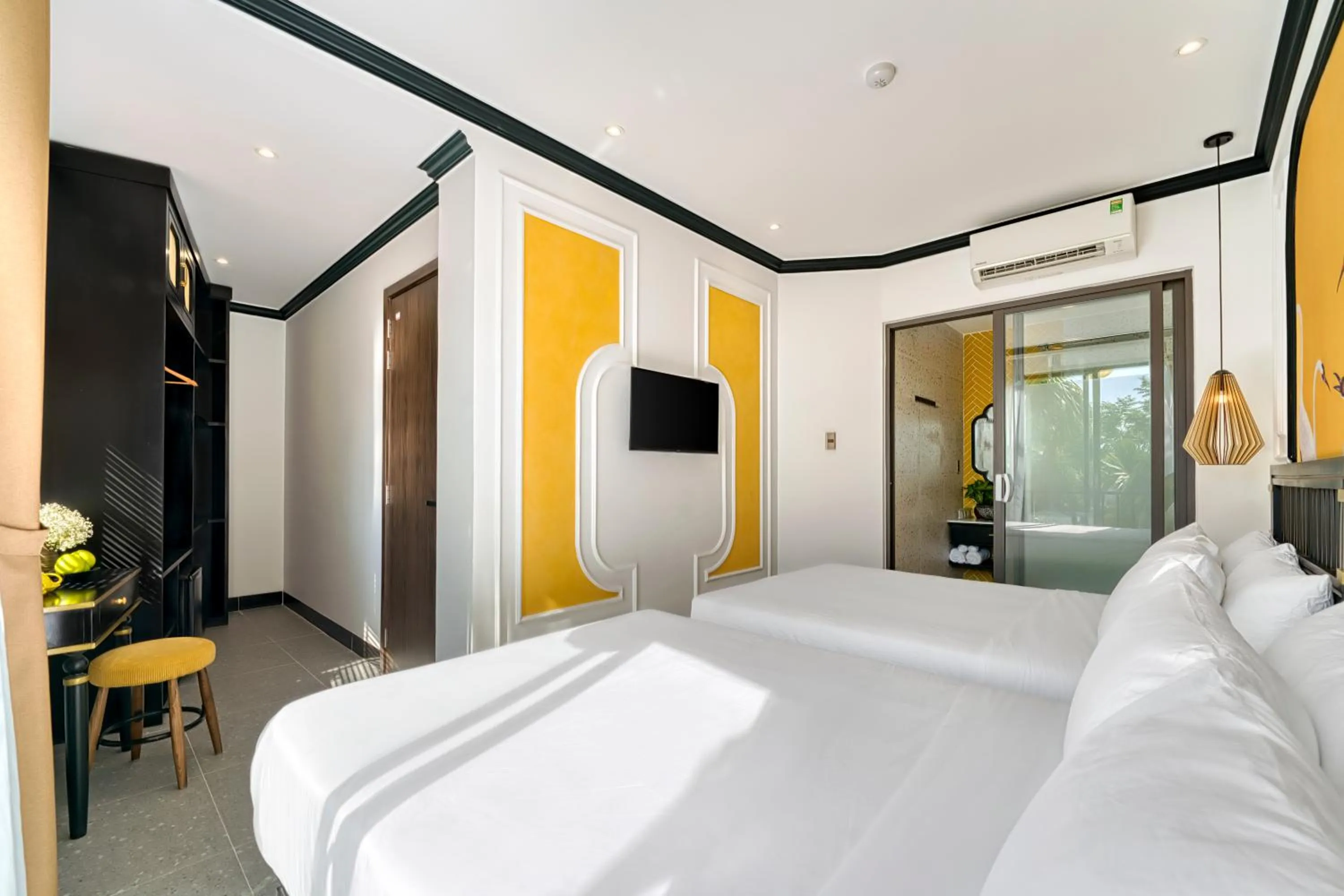 Bed in Rokas Hoi An Boutique Hotel