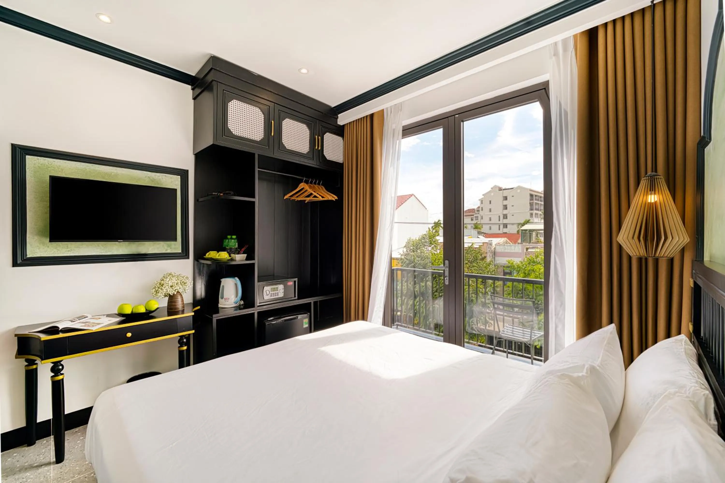 Bed in Rokas Hoi An Boutique Hotel