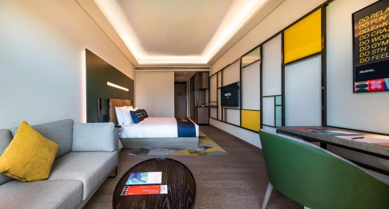 Bed in MUSTEL Hotel Guangzhou Nansha