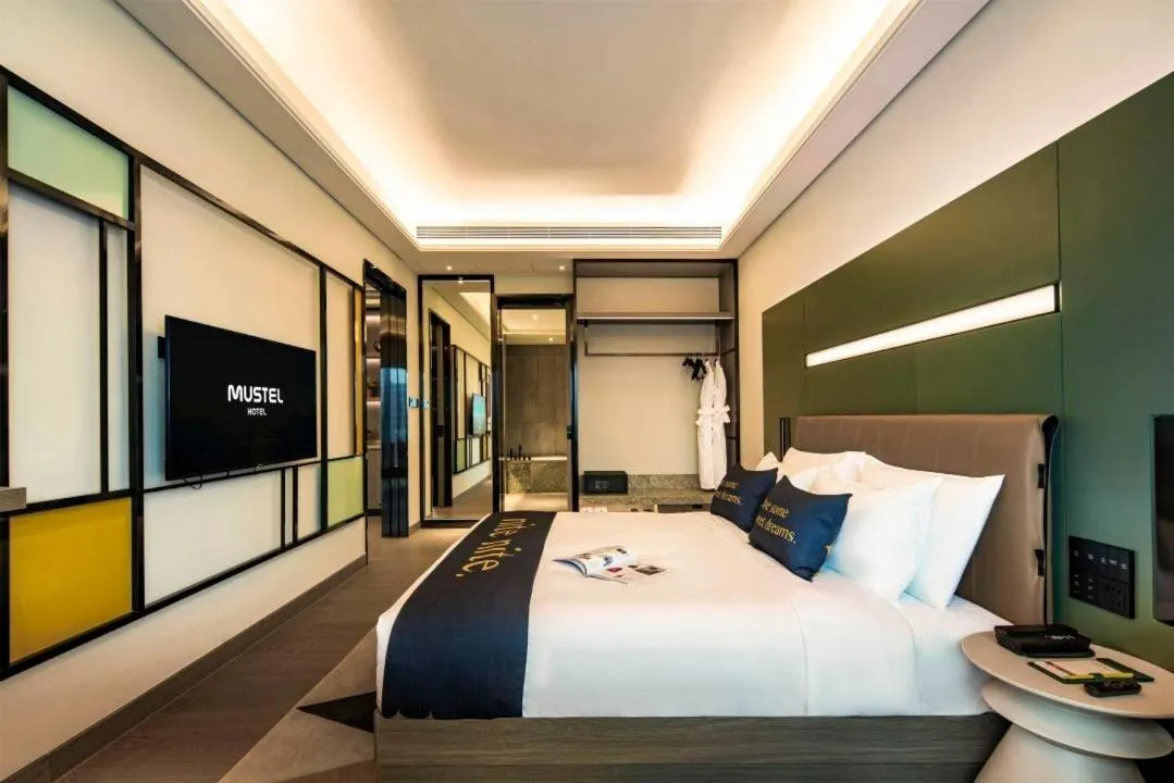 Bed in MUSTEL Hotel Guangzhou Nansha