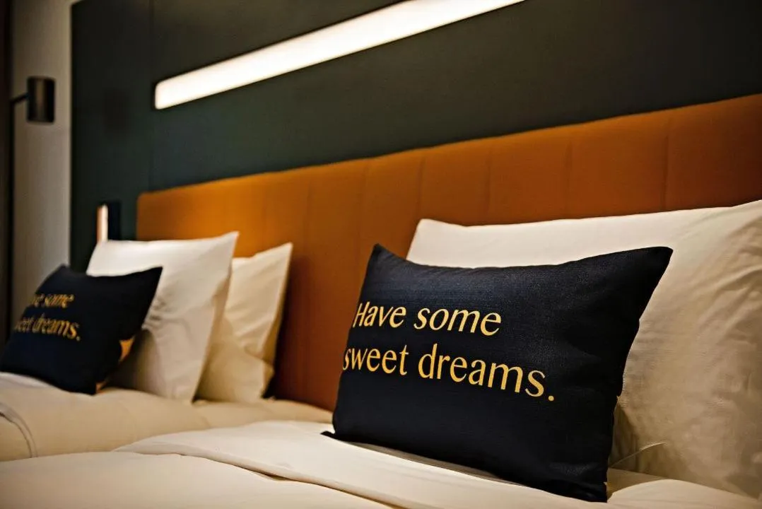 Bed in MUSTEL Hotel Guangzhou Nansha