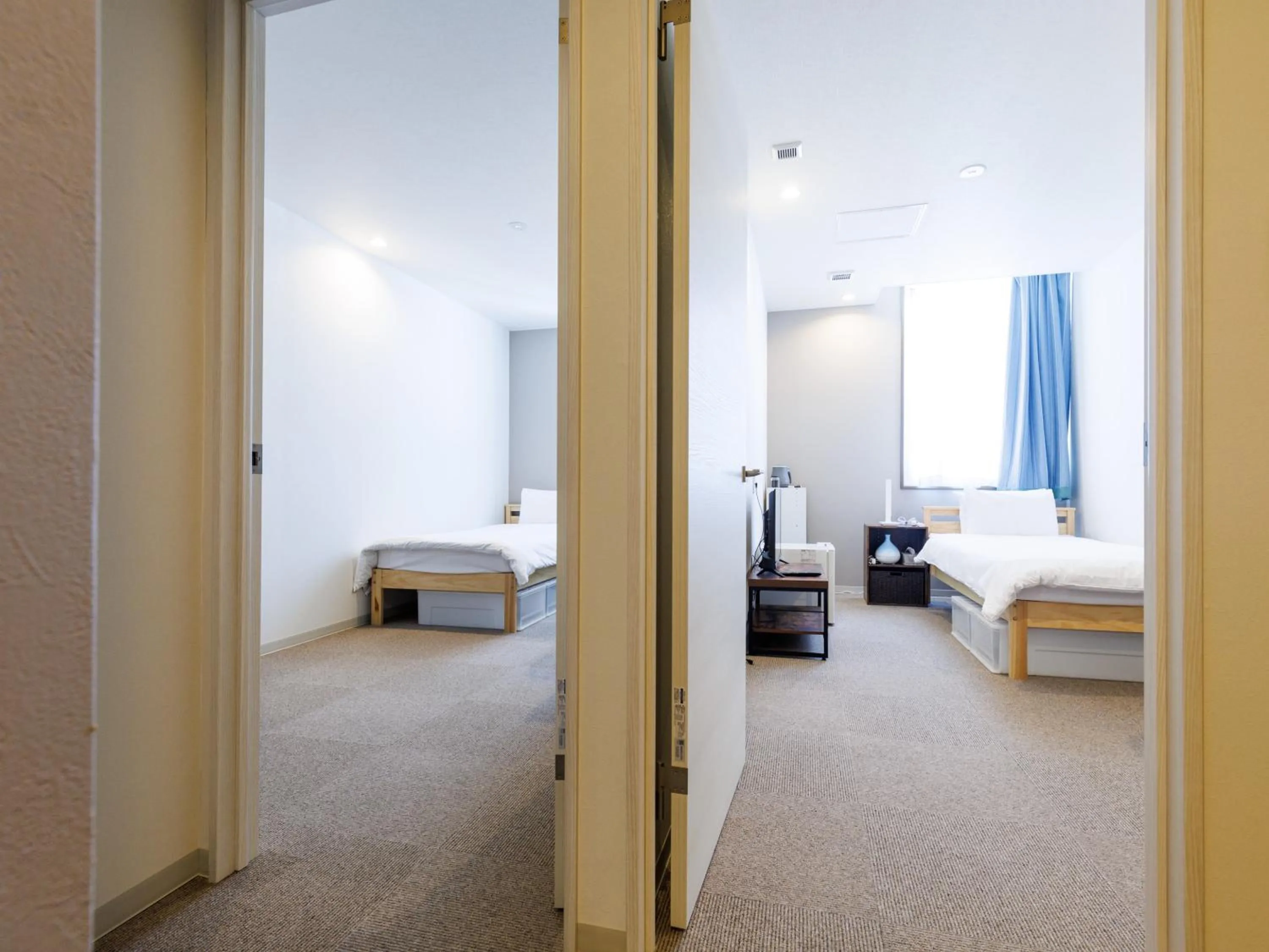 Bed in Tabist Kitami Athlete Stays