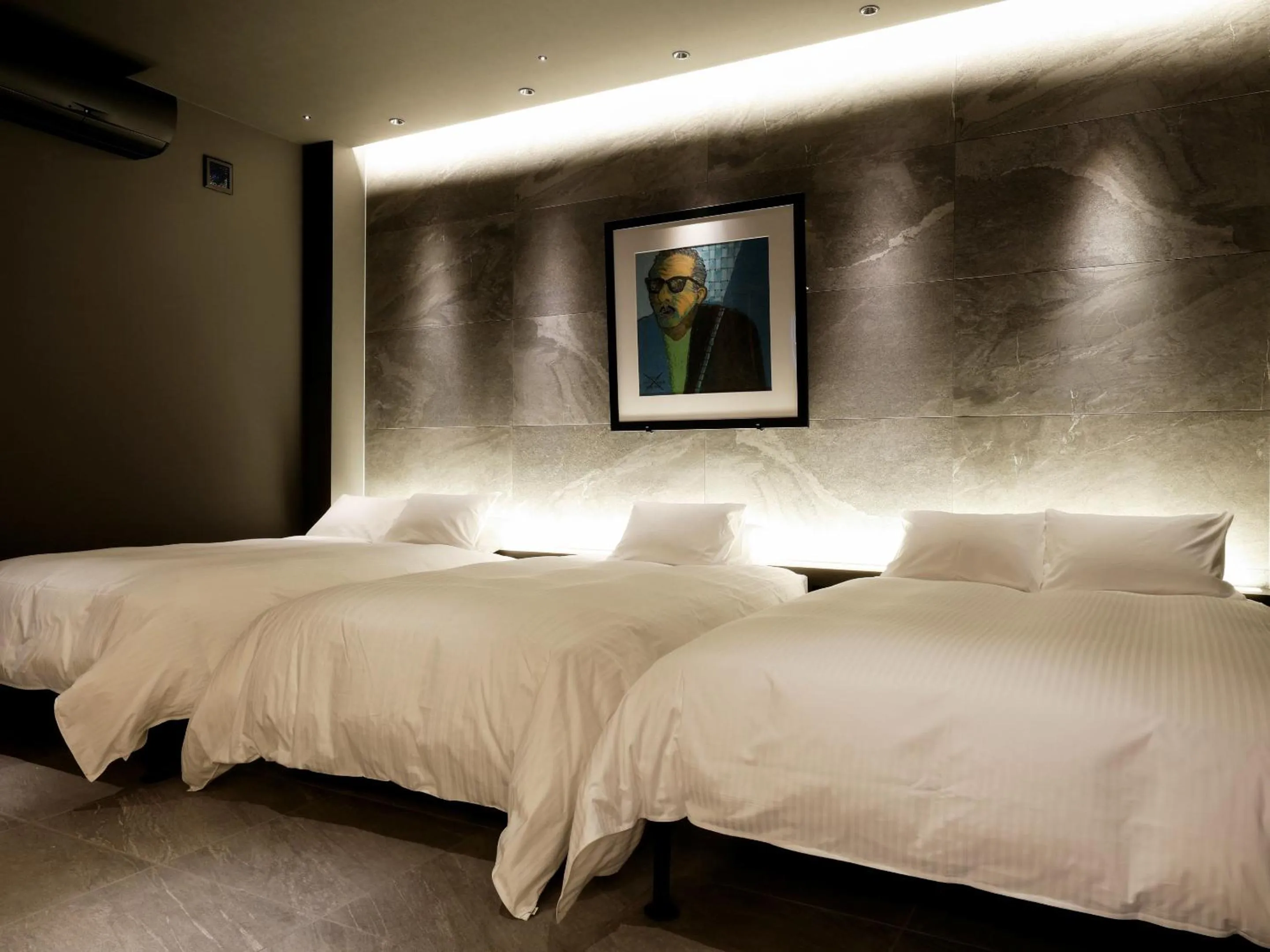 Bed in FIVE SPRING RESORT THE SHIRAHAMA