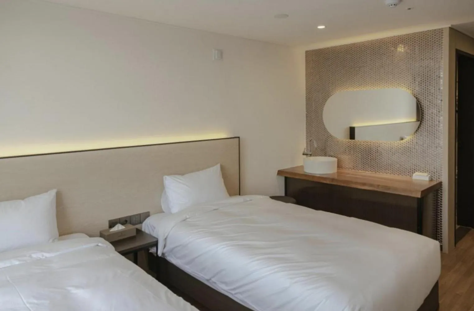 Bed in Lemain Hotel Seogwipo