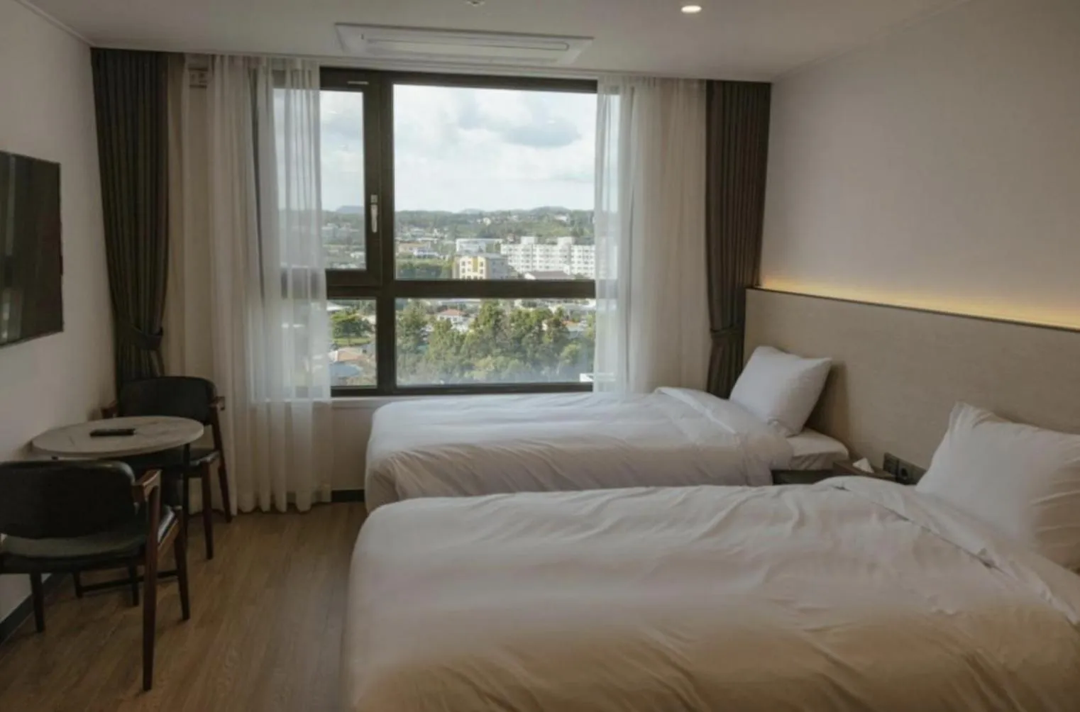 Bed in Lemain Hotel Seogwipo