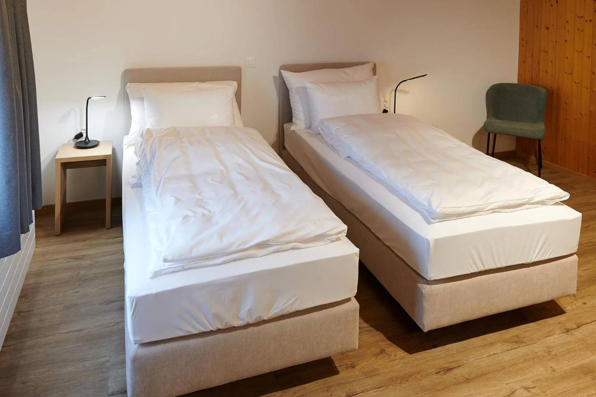 Bed in Hotel Jäger Jeuss - Murten - Self-Check-in