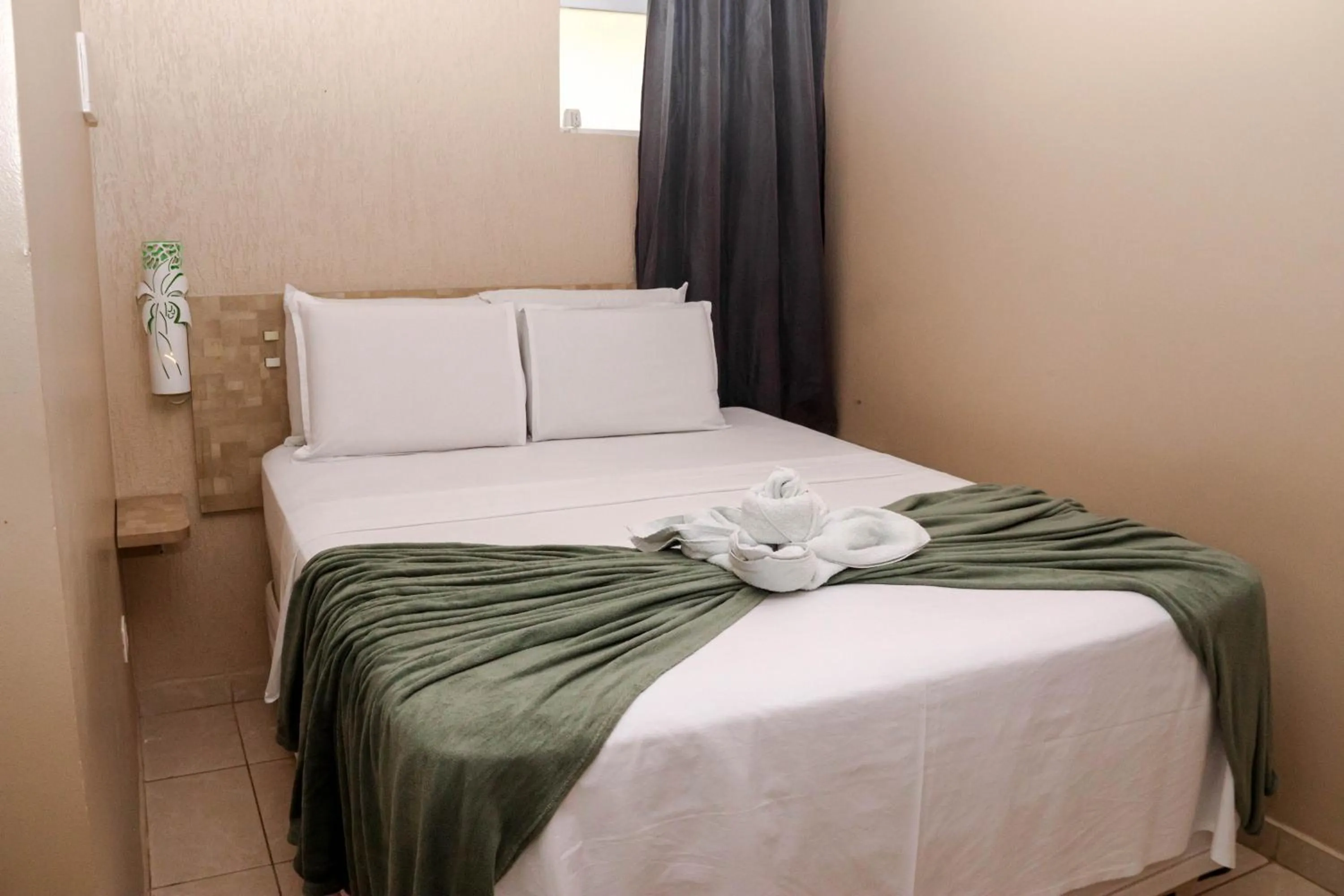 Bed in Pousada Badejo