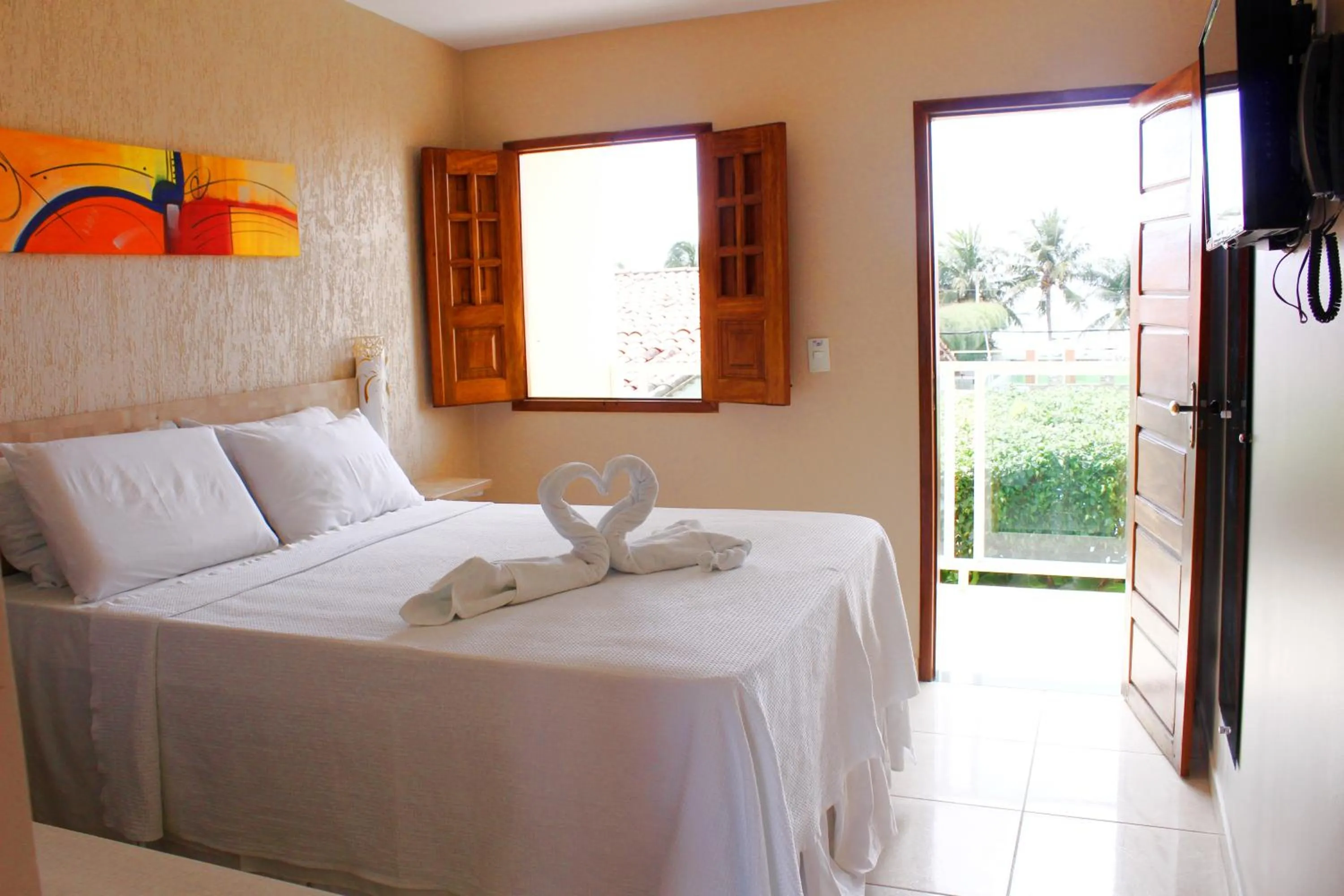 Photo of the whole room, Bed in Pousada Badejo