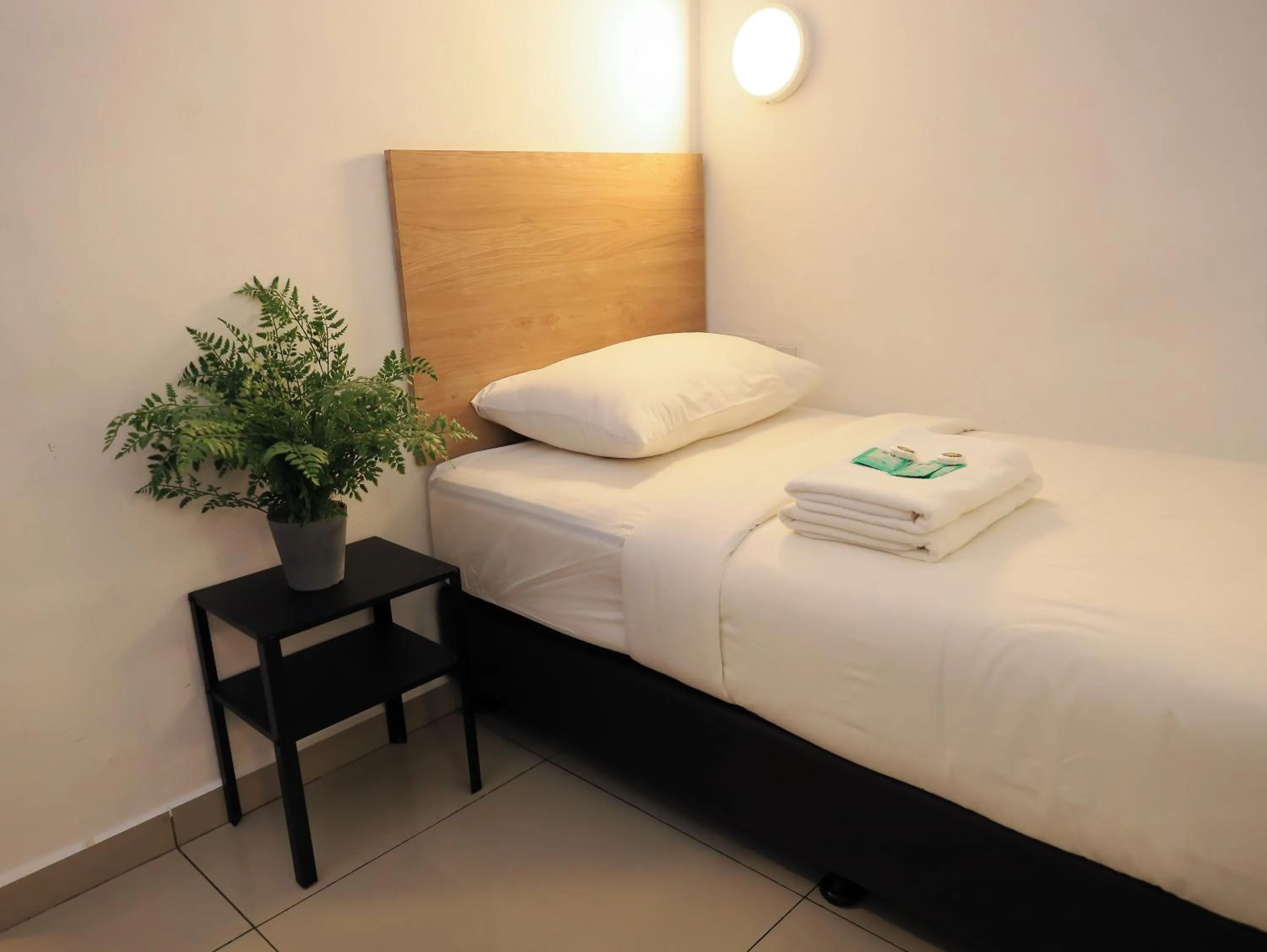 Bed in BIG TREE HOTEL