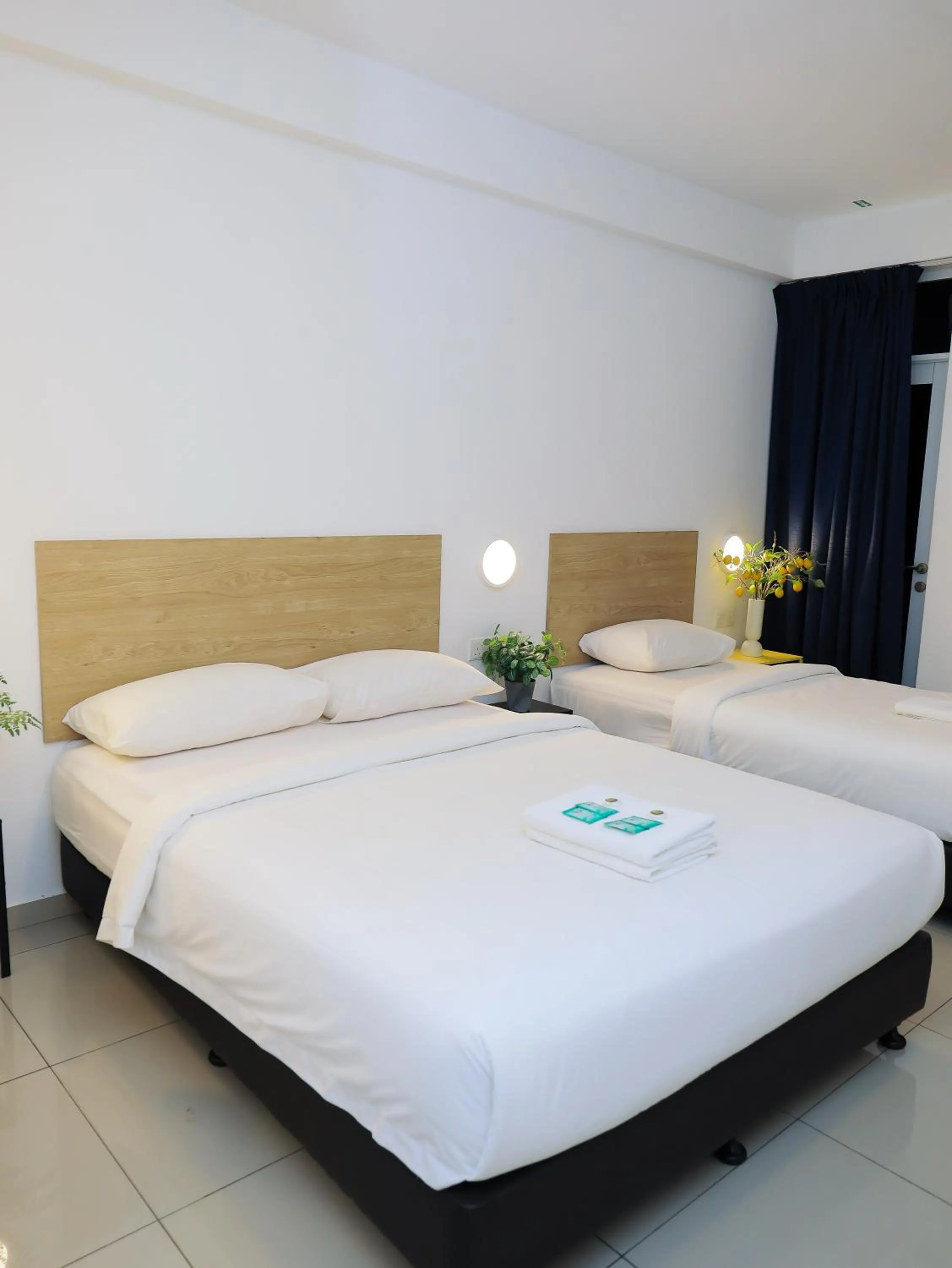 Bed in BIG TREE HOTEL