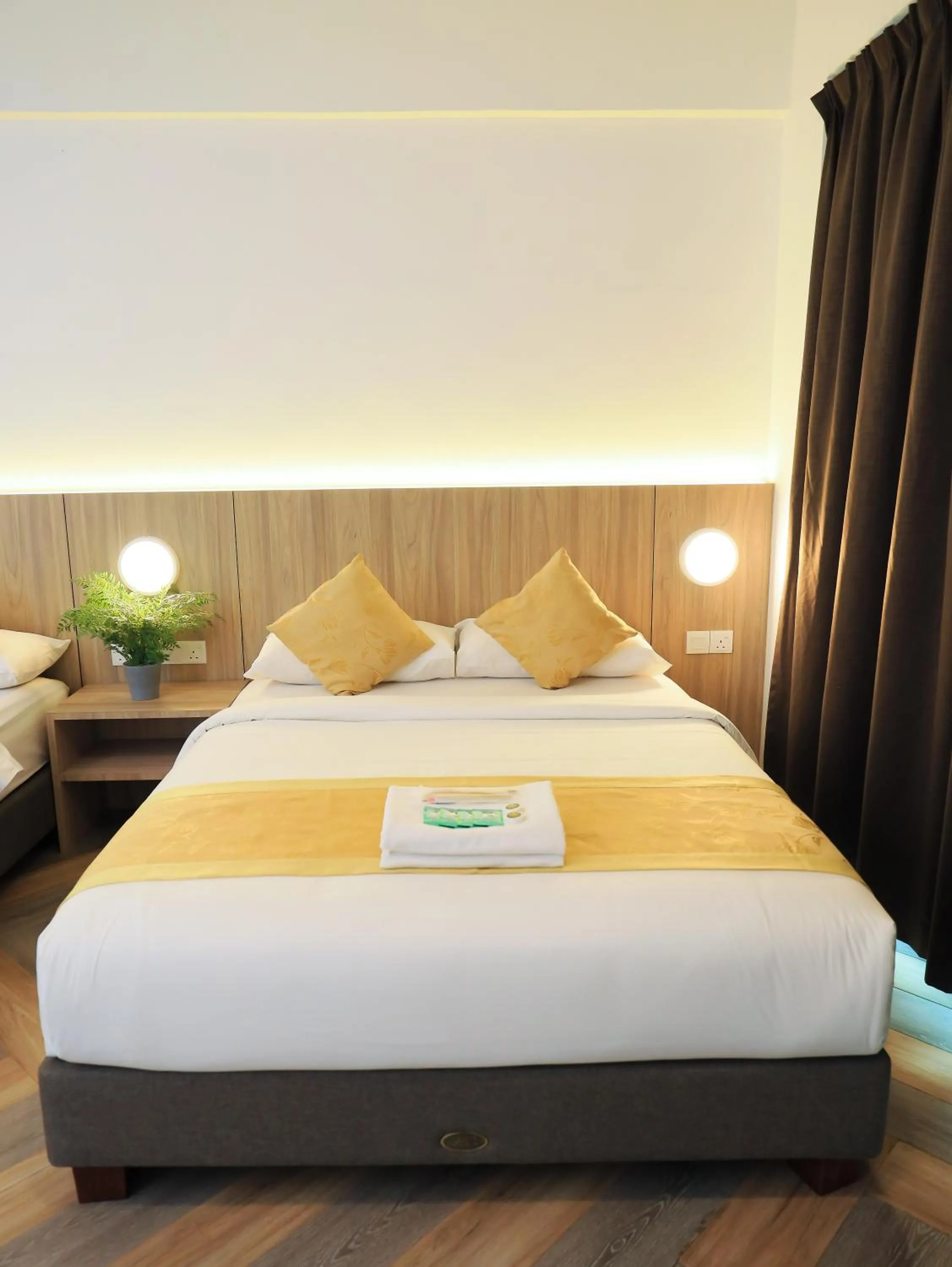 Bed in BIG TREE HOTEL