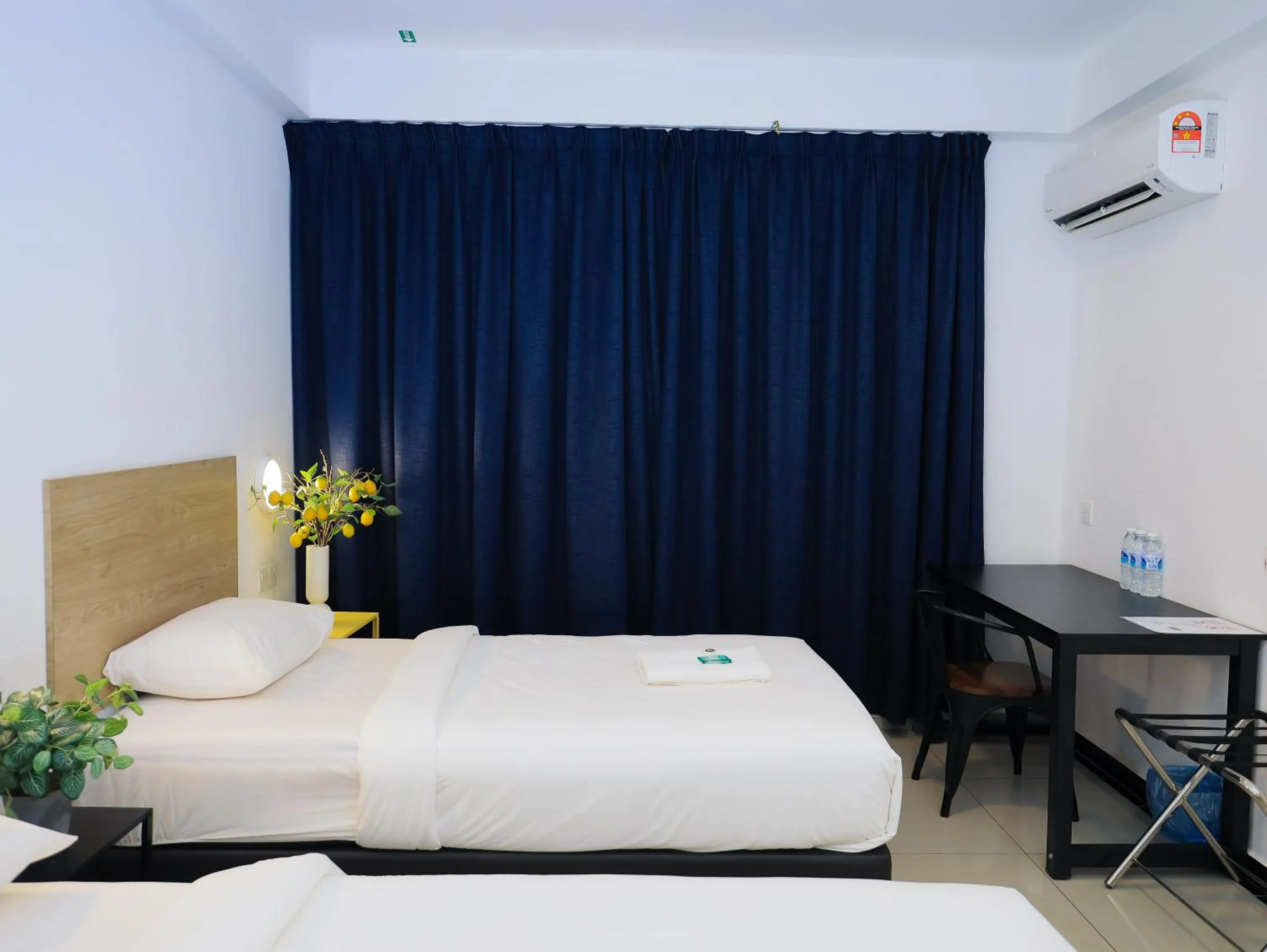 Bed in BIG TREE HOTEL