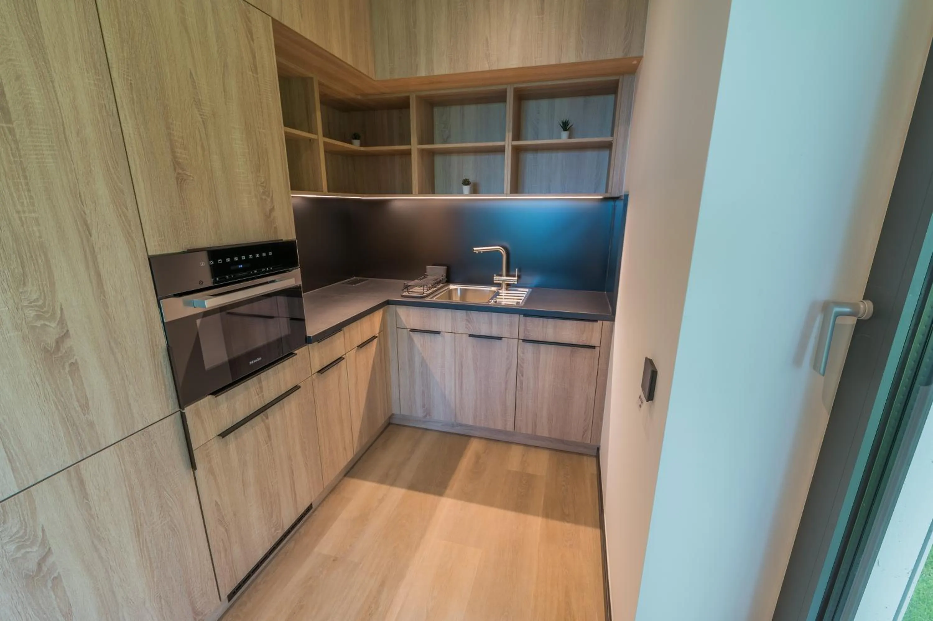 Kitchen or kitchenette in BJ81 Suite Hotel