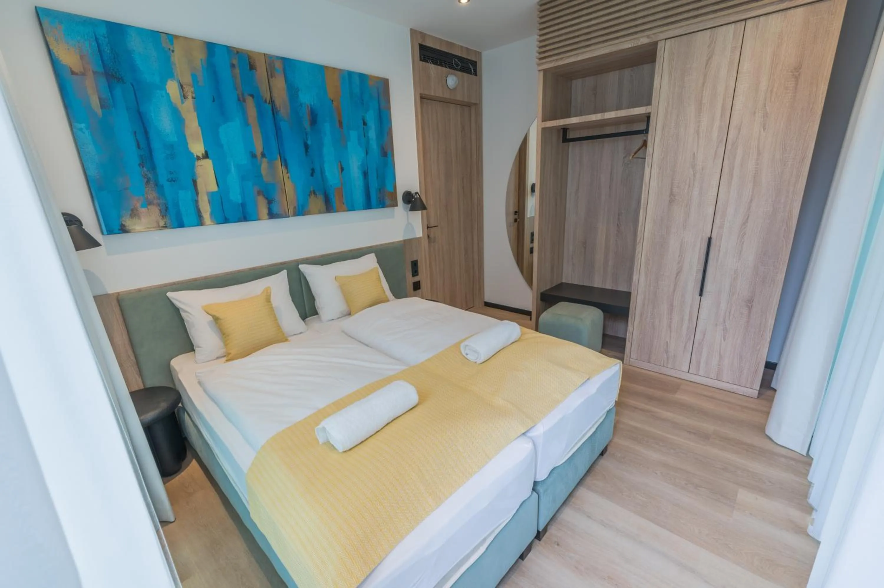 Bed in BJ81 Suite Hotel