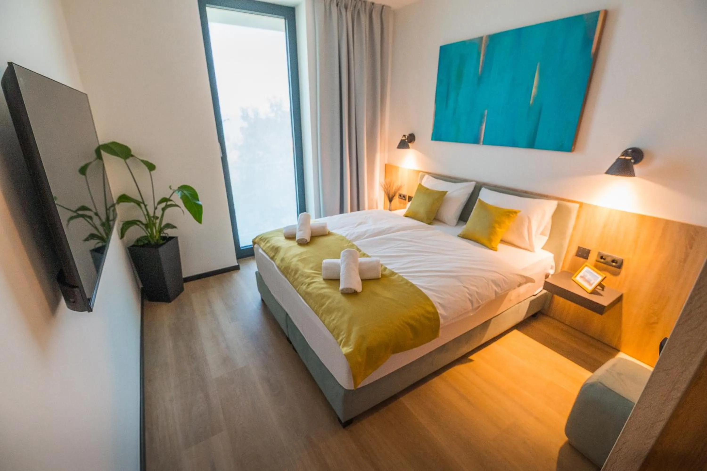 Bed in BJ81 Suite Hotel